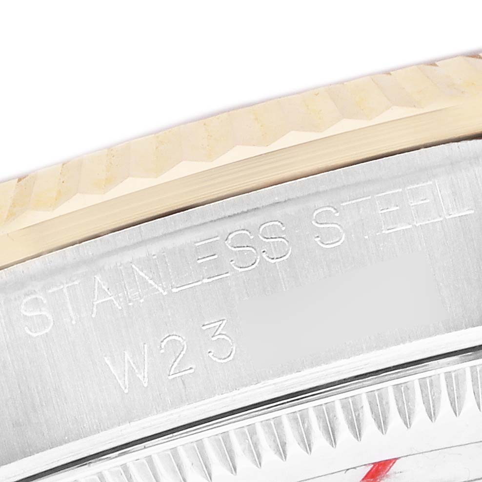 The image shows a close-up of the side of a Rolex Datejust 68273 Women's Stainless Steel Silver Dial, featuring part of the bezel and stainless steel engraving.