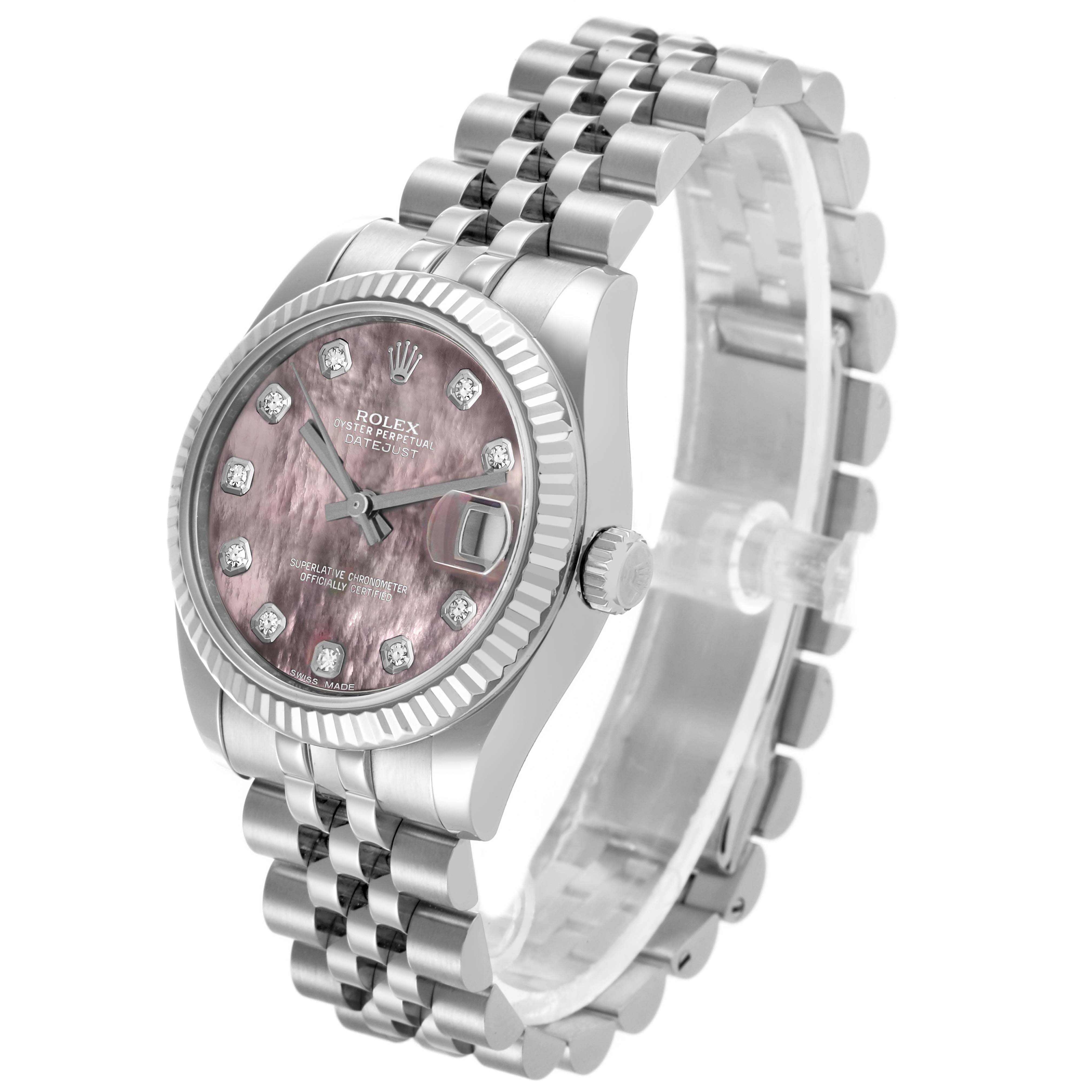 The Rolex Datejust watch is shown at a three-quarter angle, displaying the face, bezel, crown, and bracelet.