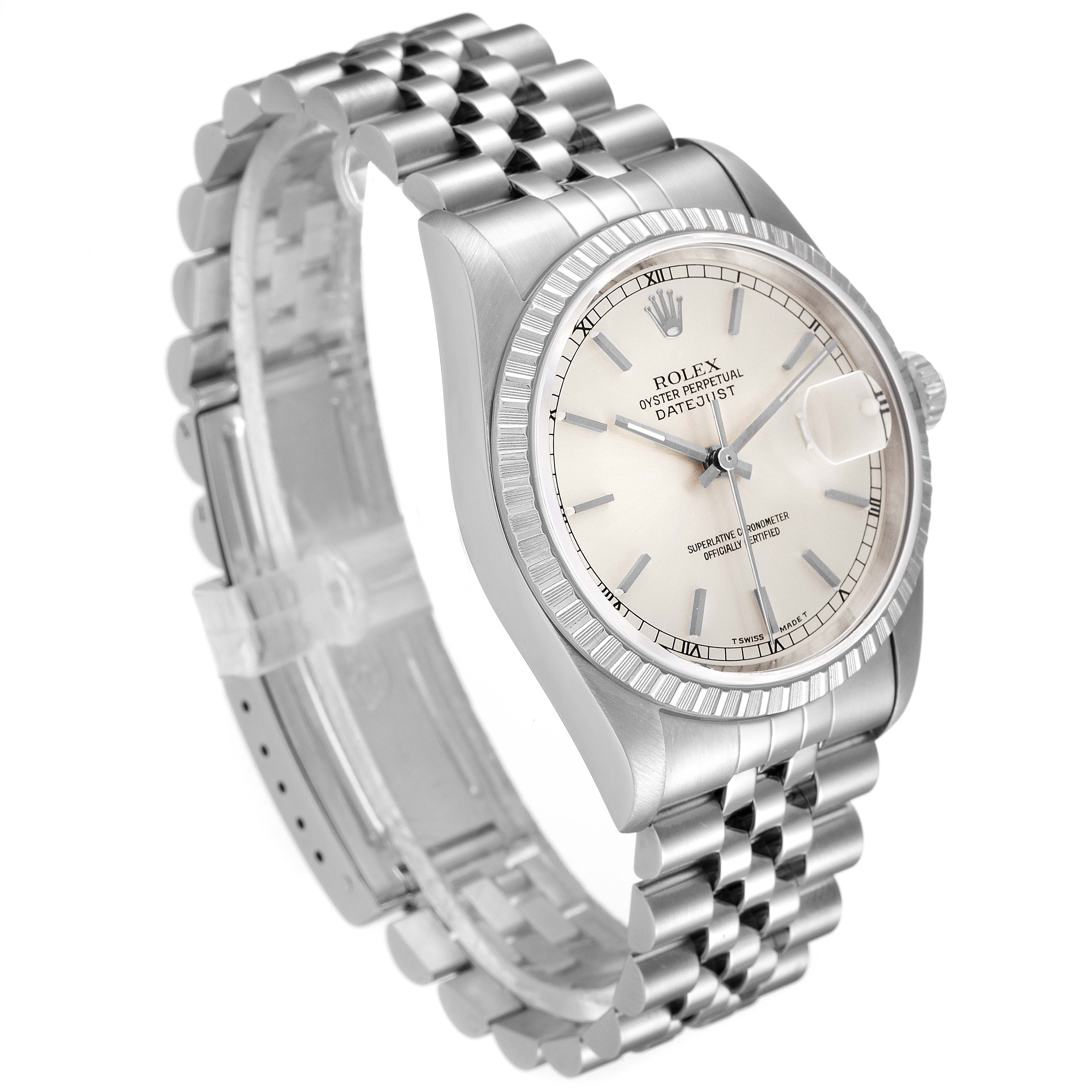 This image shows a side angle view of a Rolex Datejust 16220 Men's Stainless Steel Silver Dial 16220 Men's Stainless Steel Silver Dial watch, highlighting its case, dial, bezel, and Jubilee bracelet.