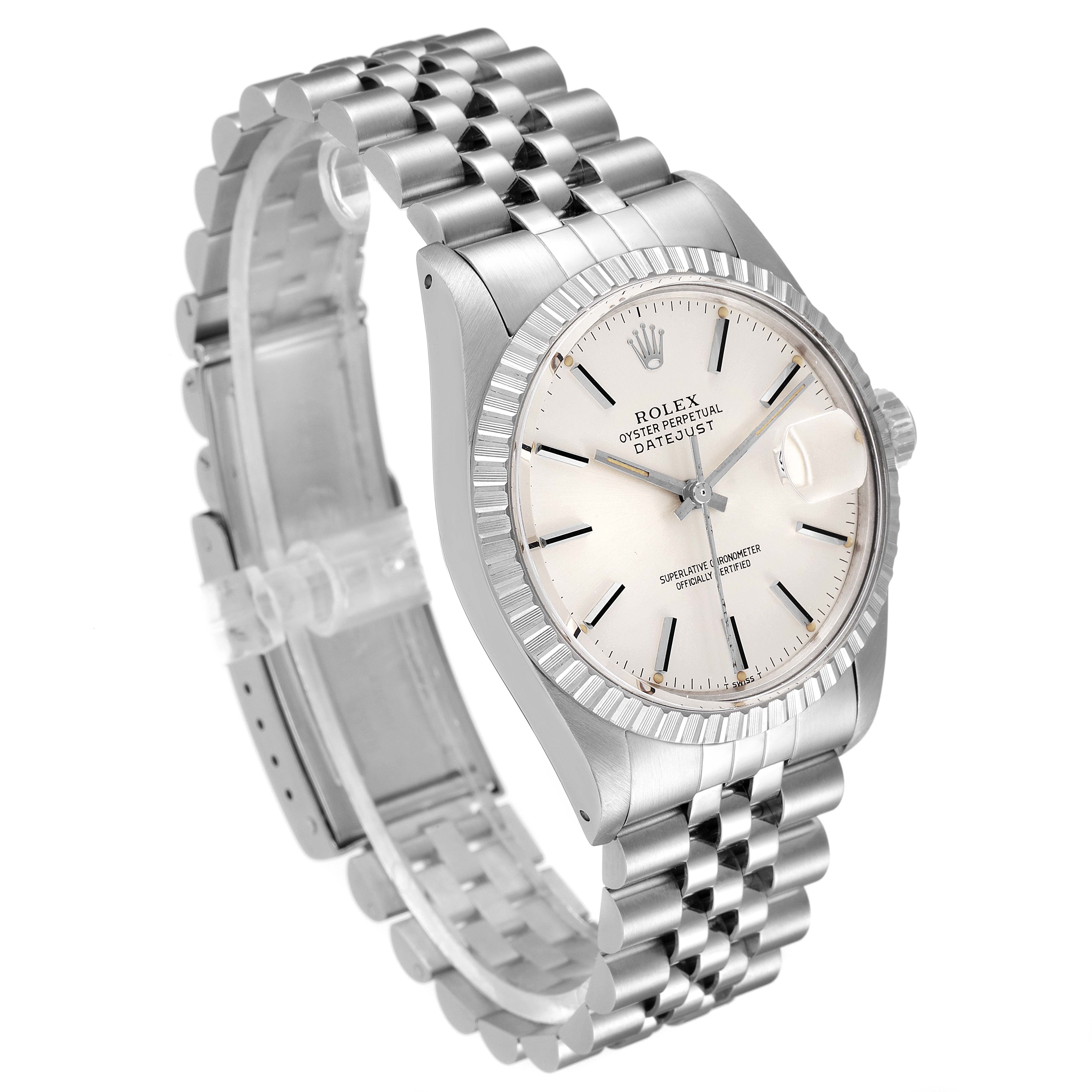 The Vintage Collection Rolex watch is shown at a three-quarter angle, highlighting its face, bezel, crown, and bracelet.