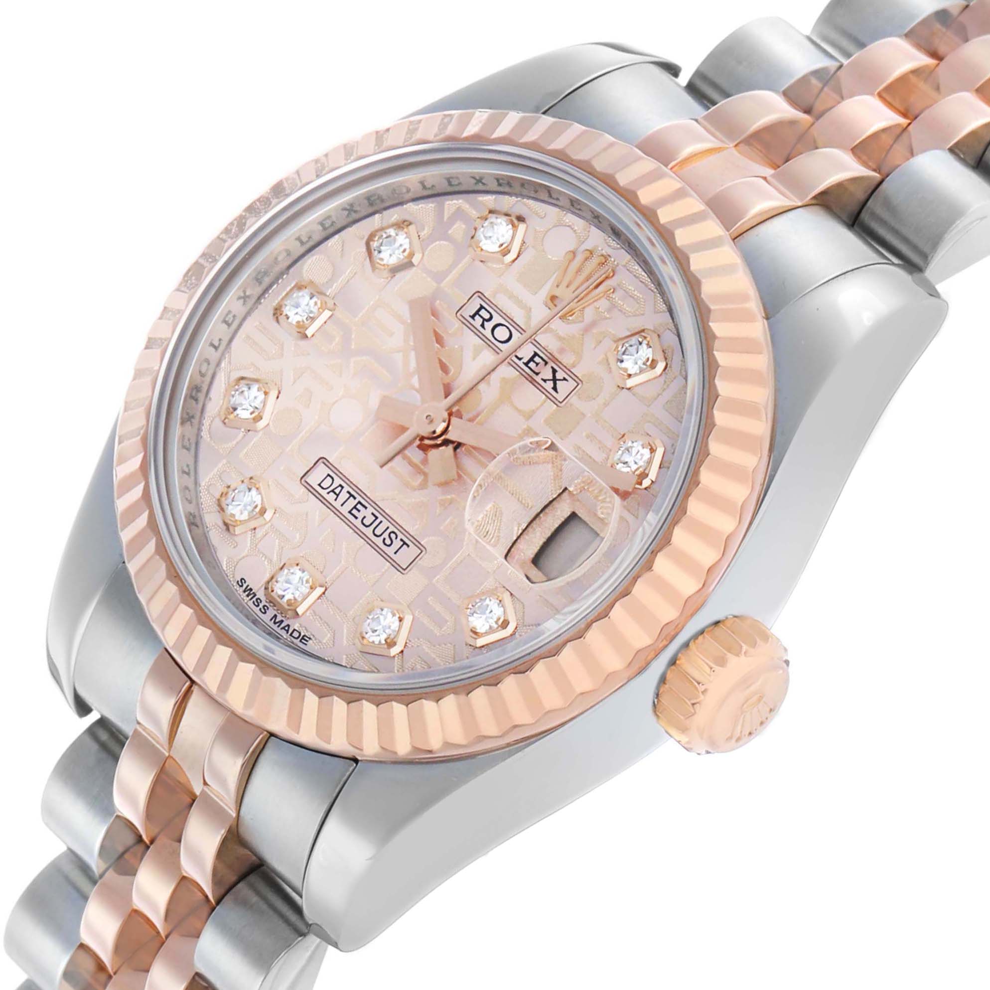 The Rolex Datejust 179171 Women's Steel and Gold (two tone) Pink Dial watch is shown at a 3/4 angle, highlighting the bezel, crown, dial, and a section of the bracelet.