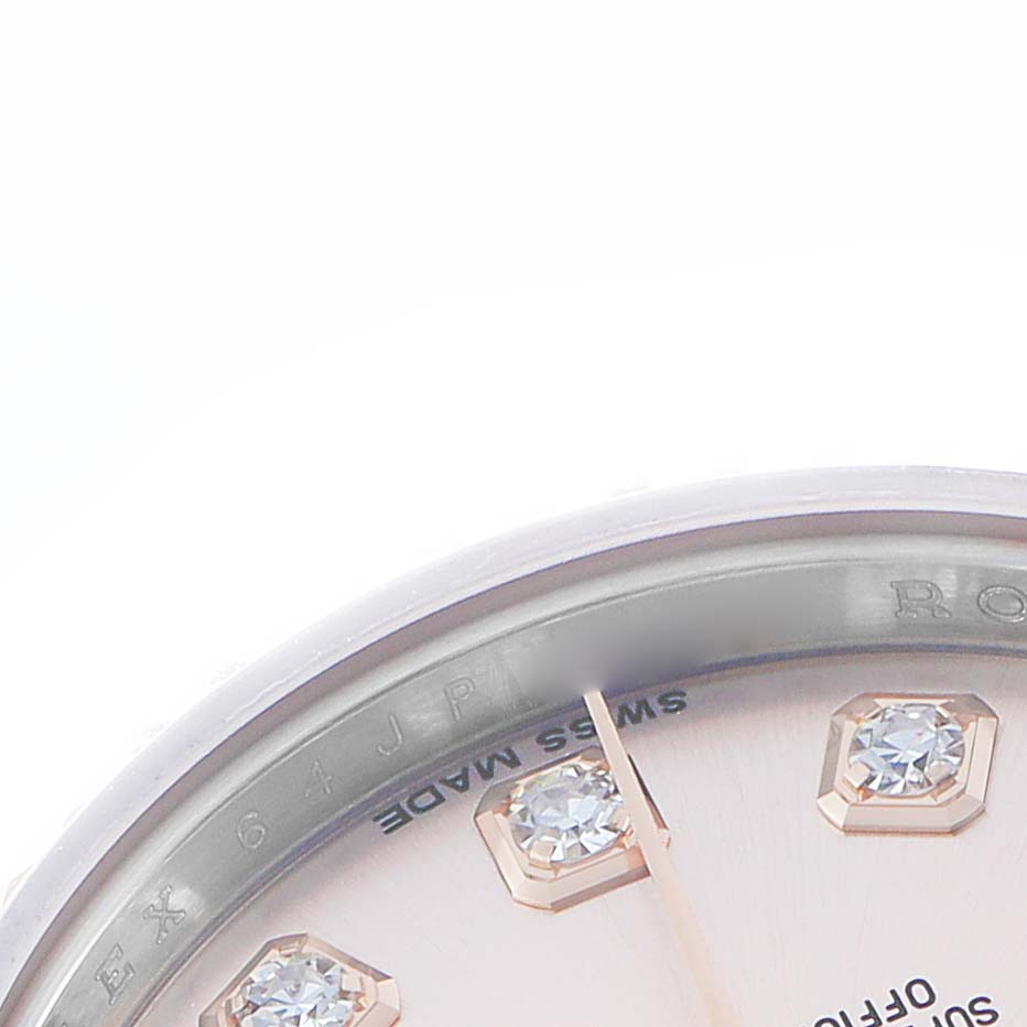 The image shows a close-up of the Rolex Datejust 179171 Women's Steel and Gold (two tone) Pink Dial watch face, focusing on diamond hour markers and partial text on the dial.