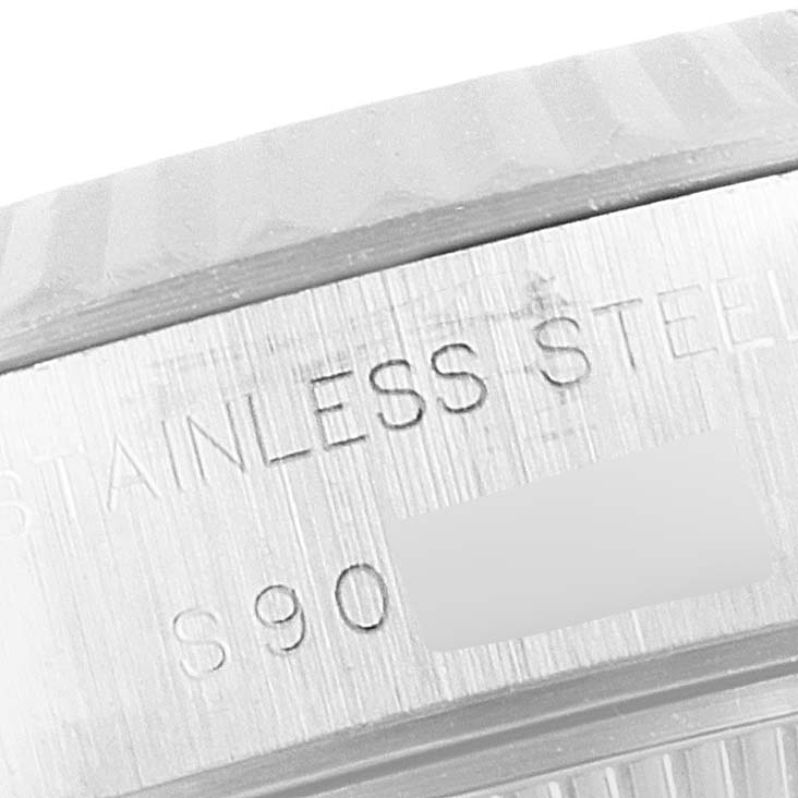 This close-up image shows the caseback with "STAINLESS STEEL" engraved on a Rolex Datejust 69174 Women's Stainless Steel Silver Dial 69174 Women's Stainless Steel Silver Dial watch.