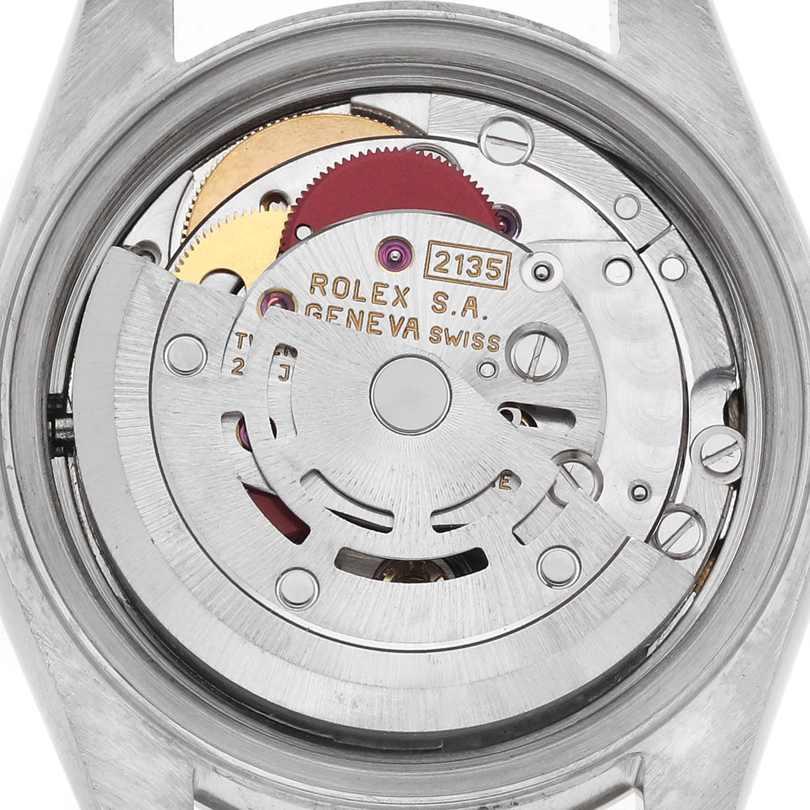 The image shows the movement of a Rolex Datejust 69173 Women's Steel and Gold (two tone) Champagne Dial watch from a rear perspective, highlighting gears and inscriptions.