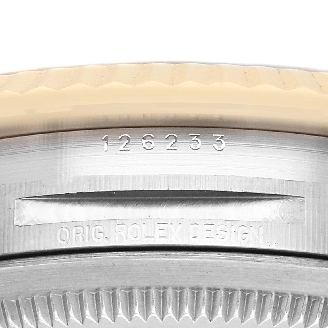 The image shows a close-up of the Rolex Datejust 126233 Men's Steel and Gold (two tone) Black Dial case side, highlighting the model number engraving and part of the bezel.