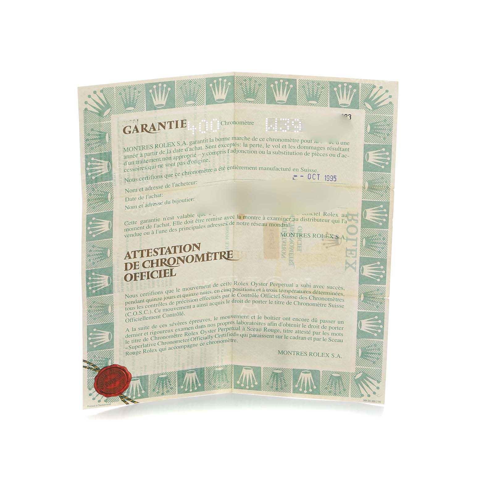 The image shows a warranty certificate for a Rolex Datejust 16233 Men's Steel and Gold (two tone) White Dial with a decorative green border.