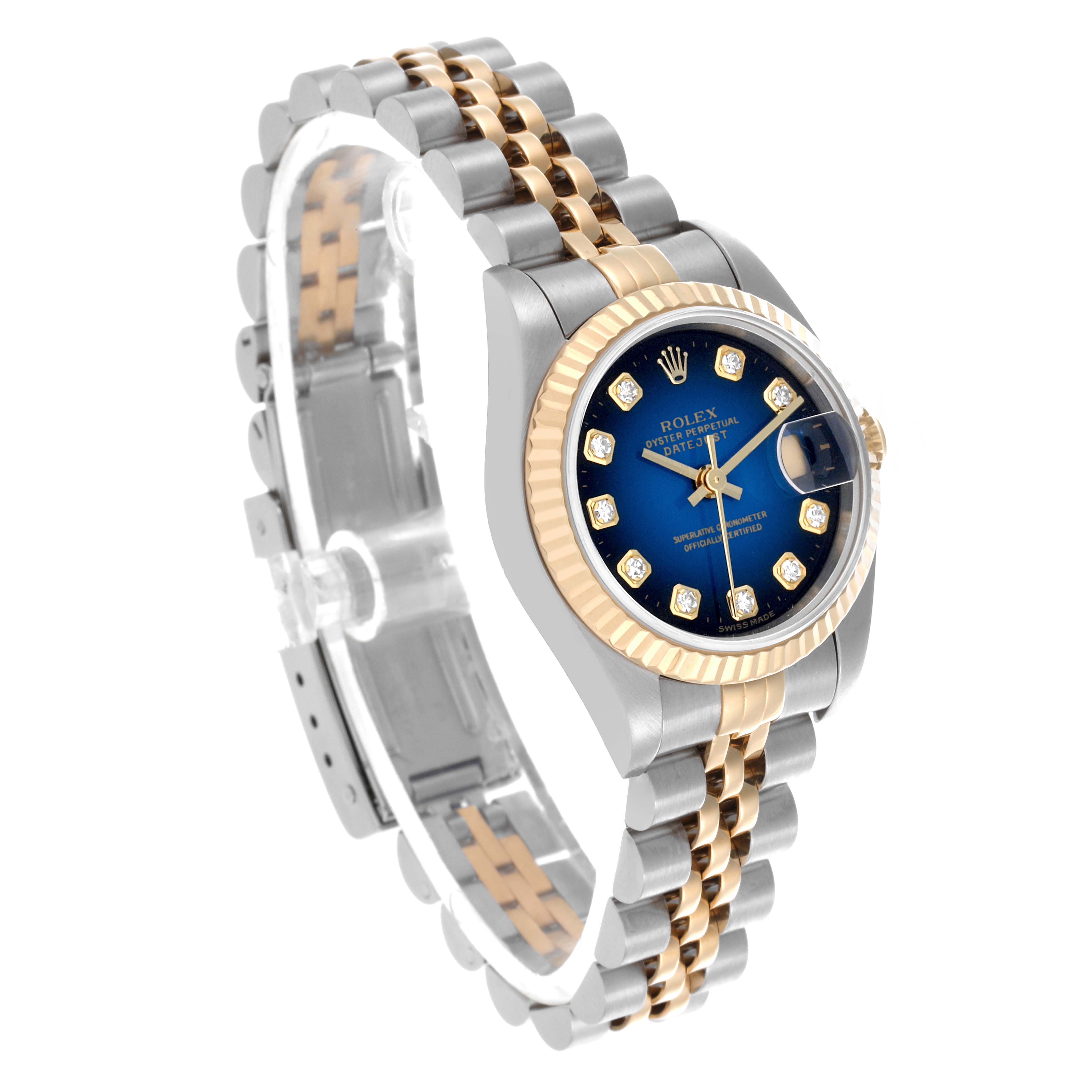The Rolex Datejust 69173 Women's Steel and Gold (two tone) Blue Dial 69173 Women's Steel and Gold (two tone) Blue Dial is shown from a three-quarter angle, displaying the blue dial, fluted bezel, and two-tone bracelet.