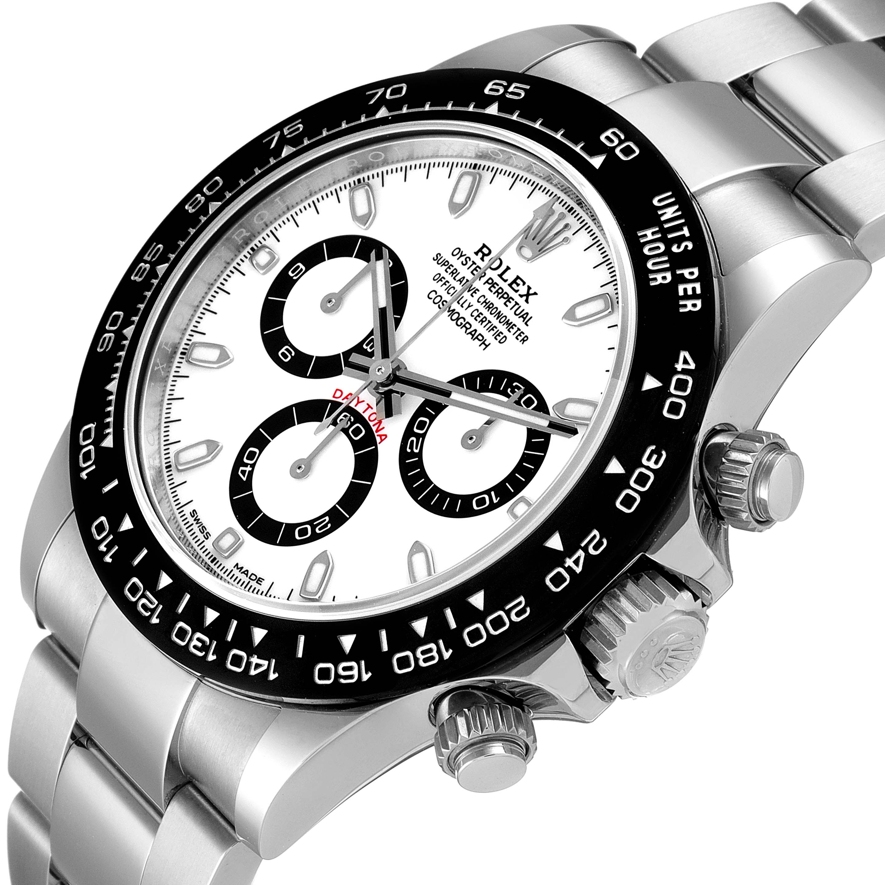 The image shows a close-up angle of the face and side of a Rolex Daytona 116500 Men's Stainless Steel White Dial 116500 Men's Stainless Steel White Dial watch, highlighting the crown and pushers.