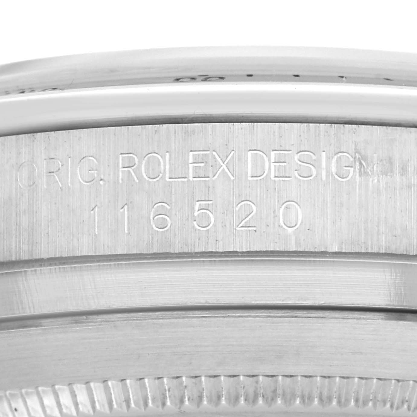 The image shows a close-up of the case side engraving on a Rolex Daytona 116520 Men's Stainless Steel White Dial 116520 Men's Stainless Steel White Dial watch, featuring details of the model number.