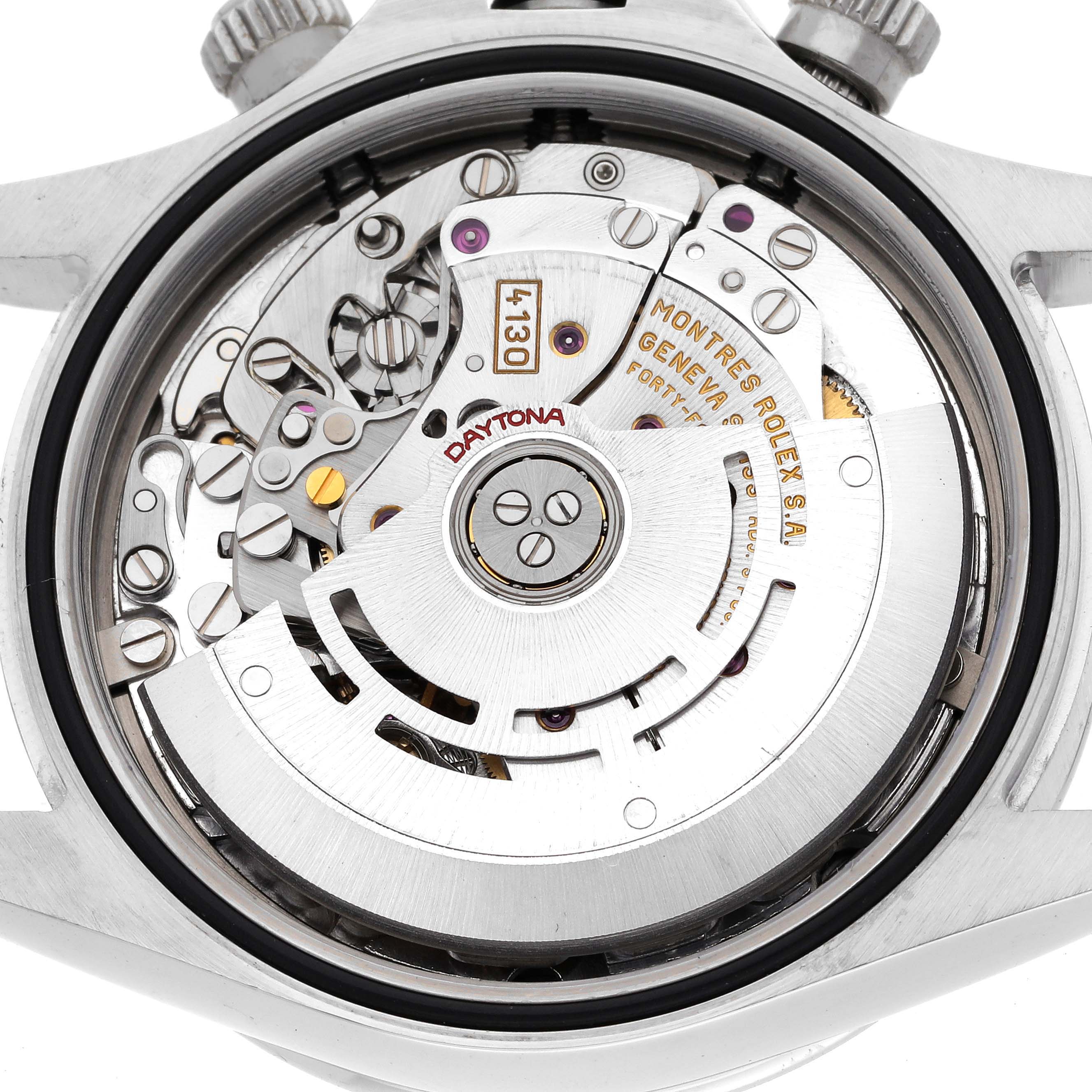 The image shows the movement of a Rolex Daytona 116520 Men's Stainless Steel White Dial 116520 Men's Stainless Steel White Dial watch from the back, highlighting its intricate mechanics.