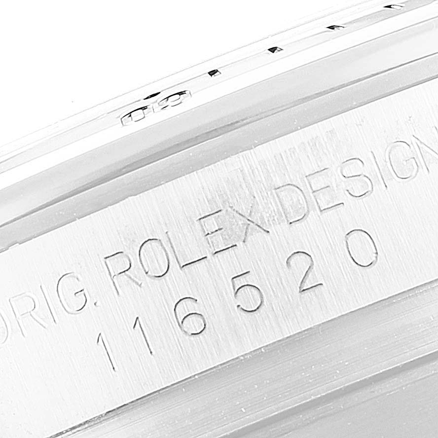The image shows a close-up of the side of a Rolex Daytona 116520 Men's Stainless Steel White Dial 116520 Men's Stainless Steel White Dial watch, highlighting the model number 116520 engraved on the case.
