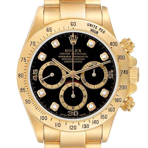 The Rolex Daytona 16528 Men's Yellow Gold Black Dial watch is shown from a front angle, highlighting the gold case, black dial, subdials, and crown.