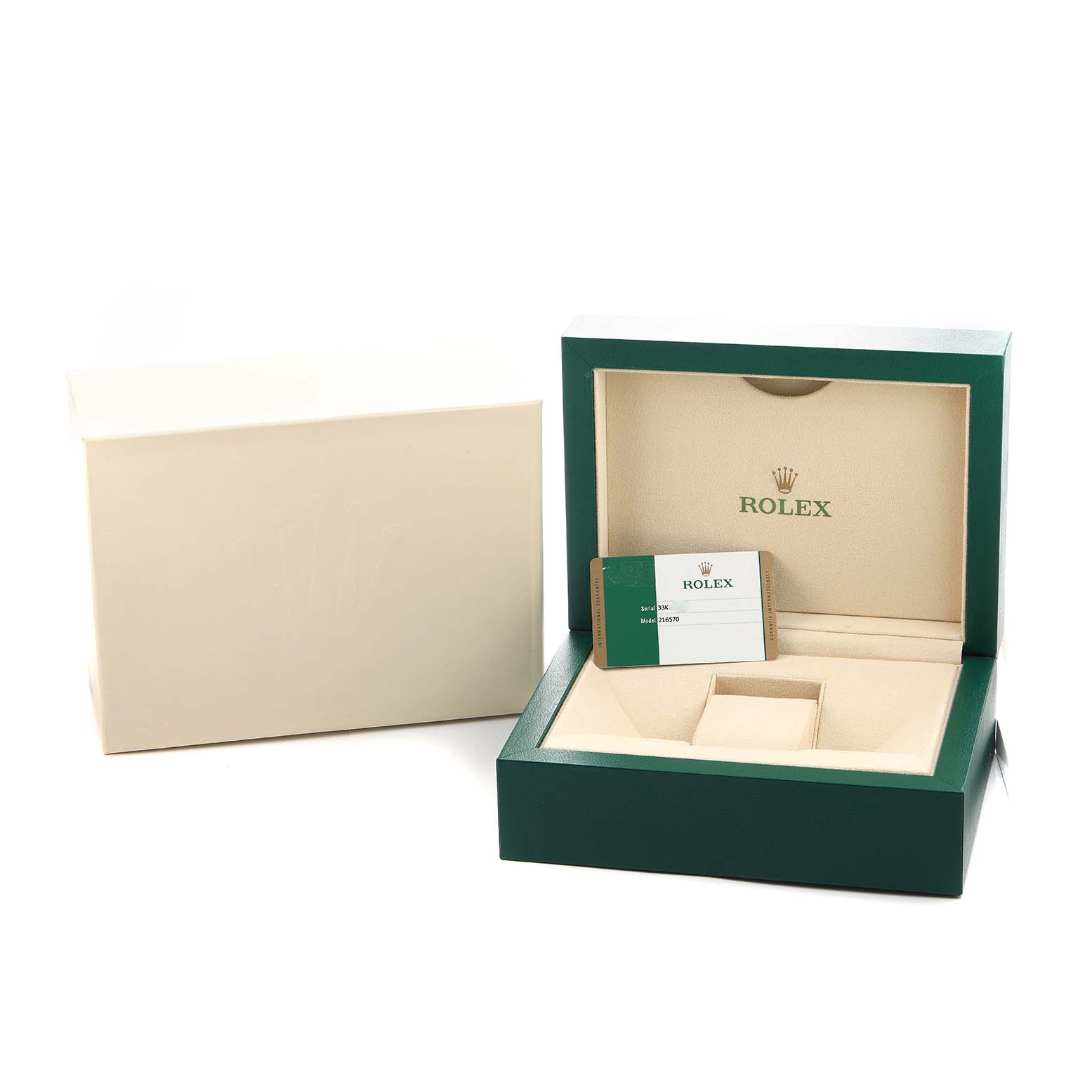 The image shows an open Rolex watch box for the Explorer model, with a card inside and an outer beige box beside it.