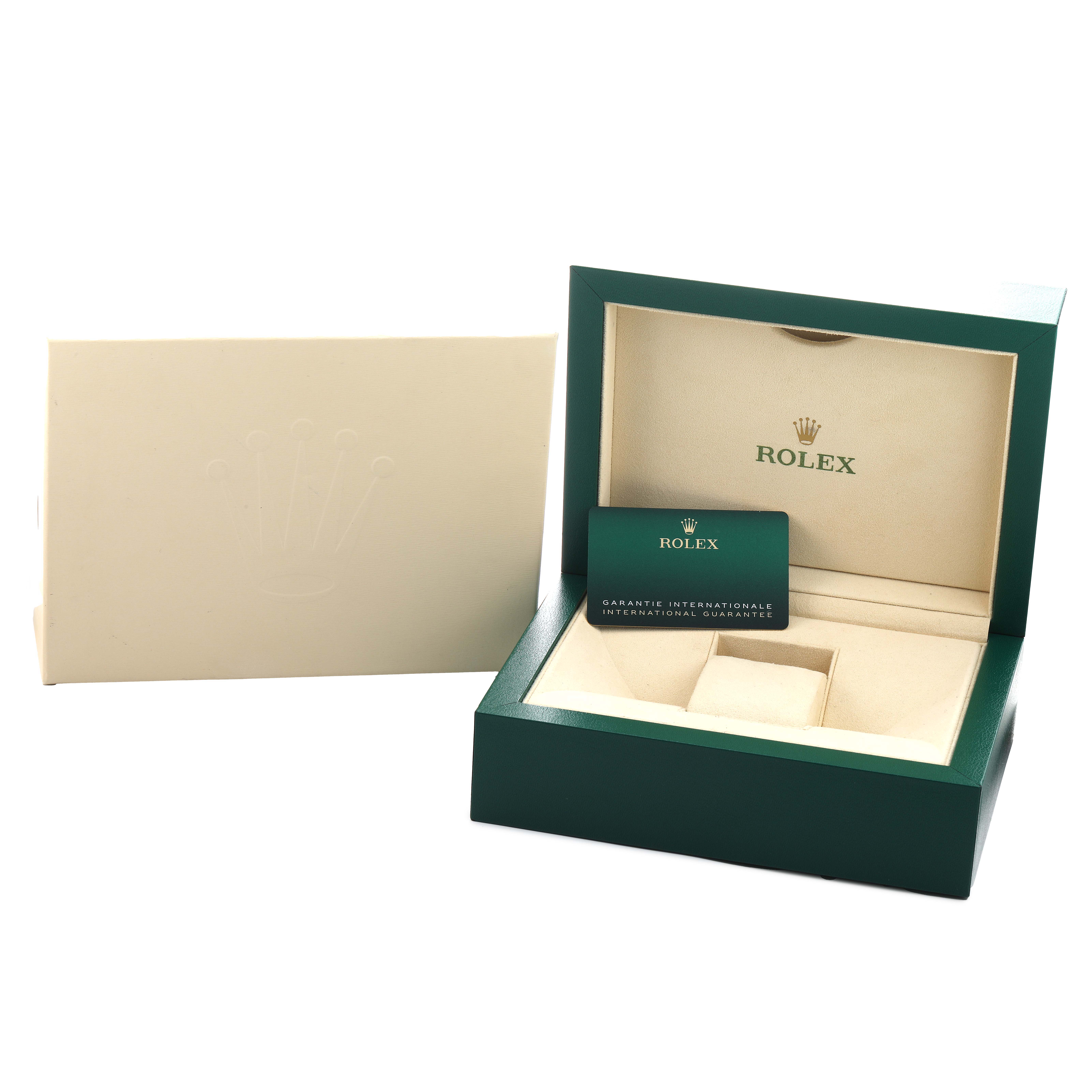 The image shows the open box and guarantee card of a Rolex GMT-Master 126710 Men's Stainless Steel Black Dial watch, viewed from the front.