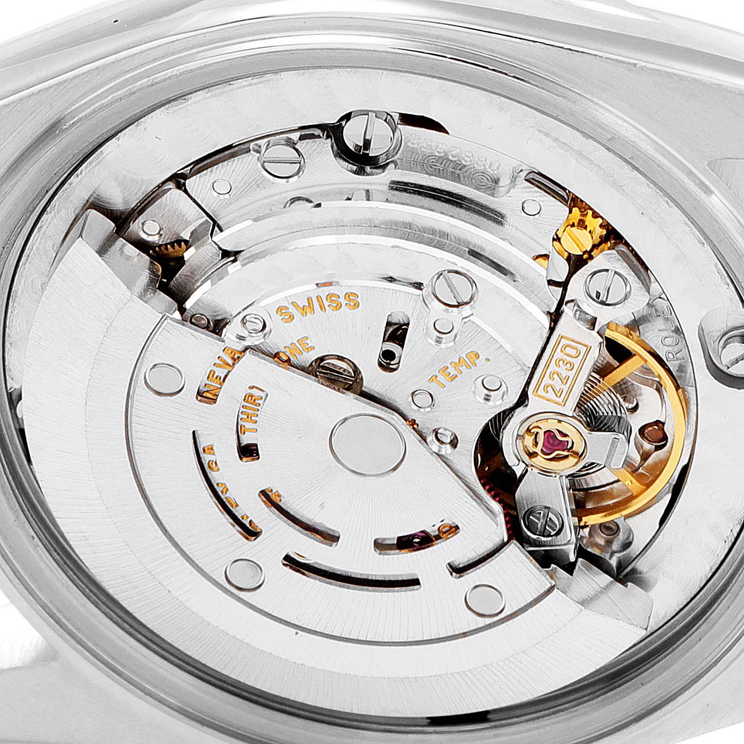 This image shows the internal movement mechanism of a Rolex Mid-Size 77080 Women
s Stainless Steel Pink Dial 77080 Women
s Stainless Steel Pink Dial model watch, viewed from the back.