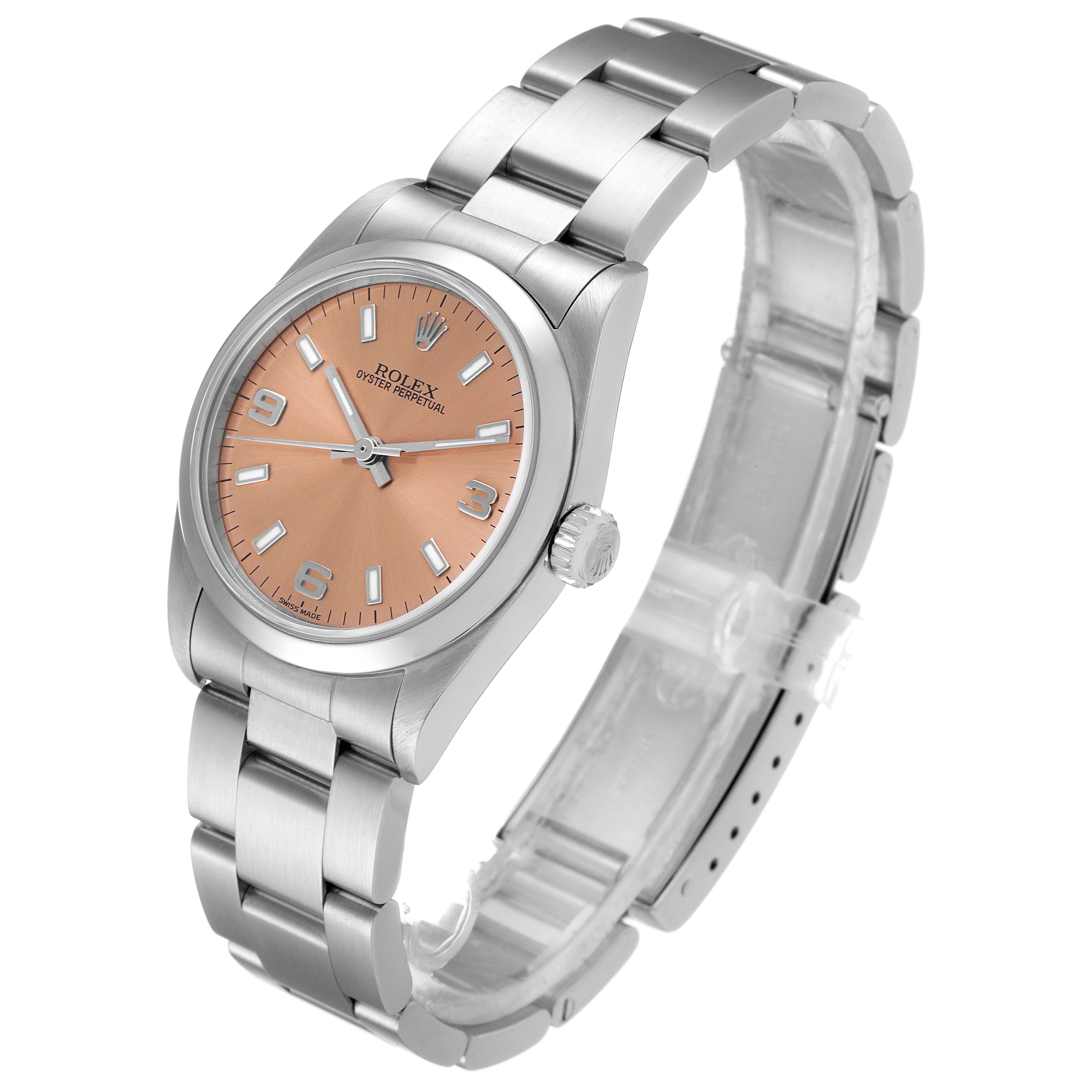The image shows a Rolex Mid-Size 77080 Women
s Stainless Steel Pink Dial 77080 Women
s Stainless Steel Pink Dial Oyster Perpetual watch from a side angle, highlighting the dial, crown, and bracelet.