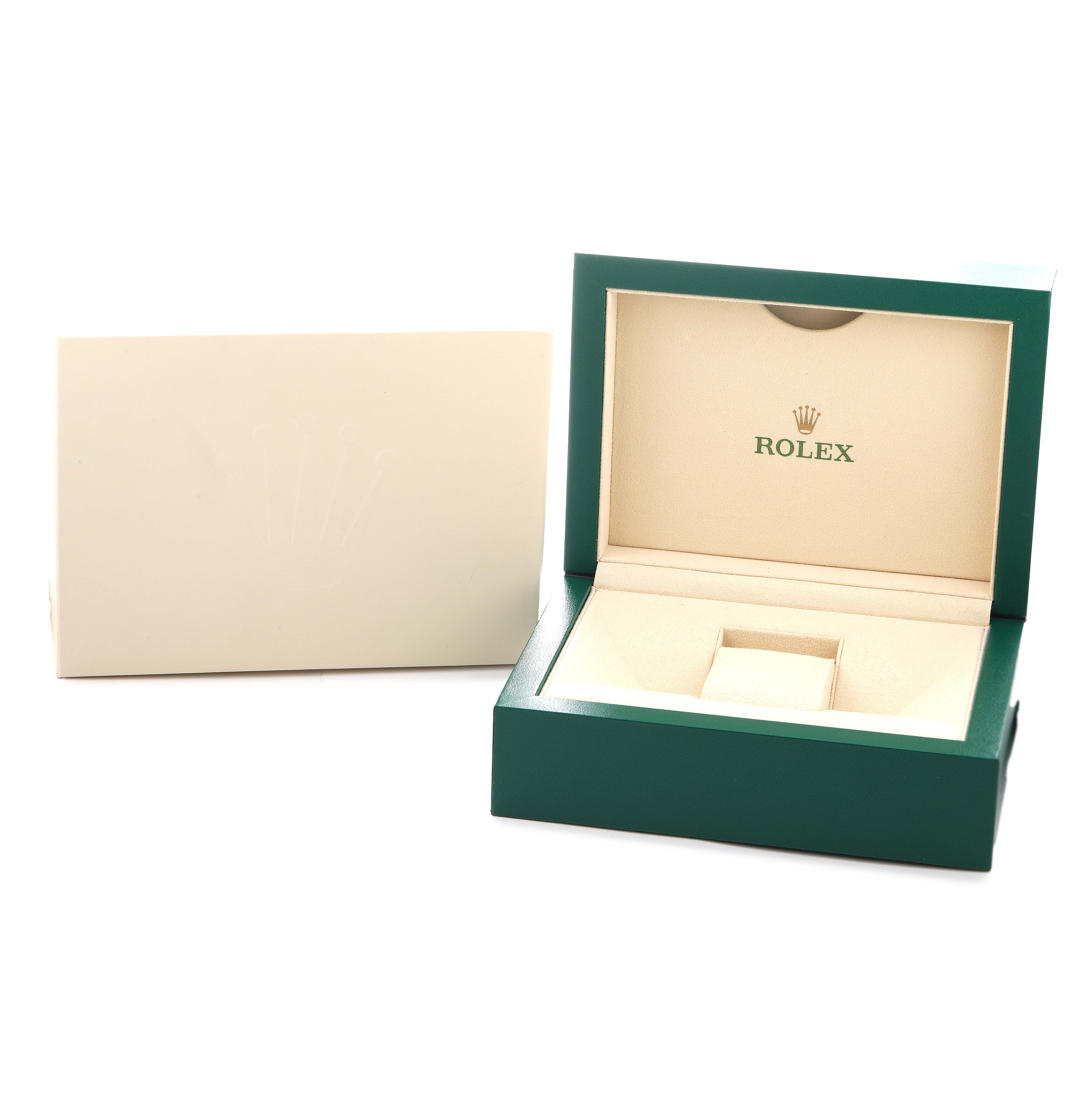 The image shows the packaging box for a Rolex Milgauss 116400GV Men's Stainless Steel Blue Dial, with an open green box and a cream outer sleeve.