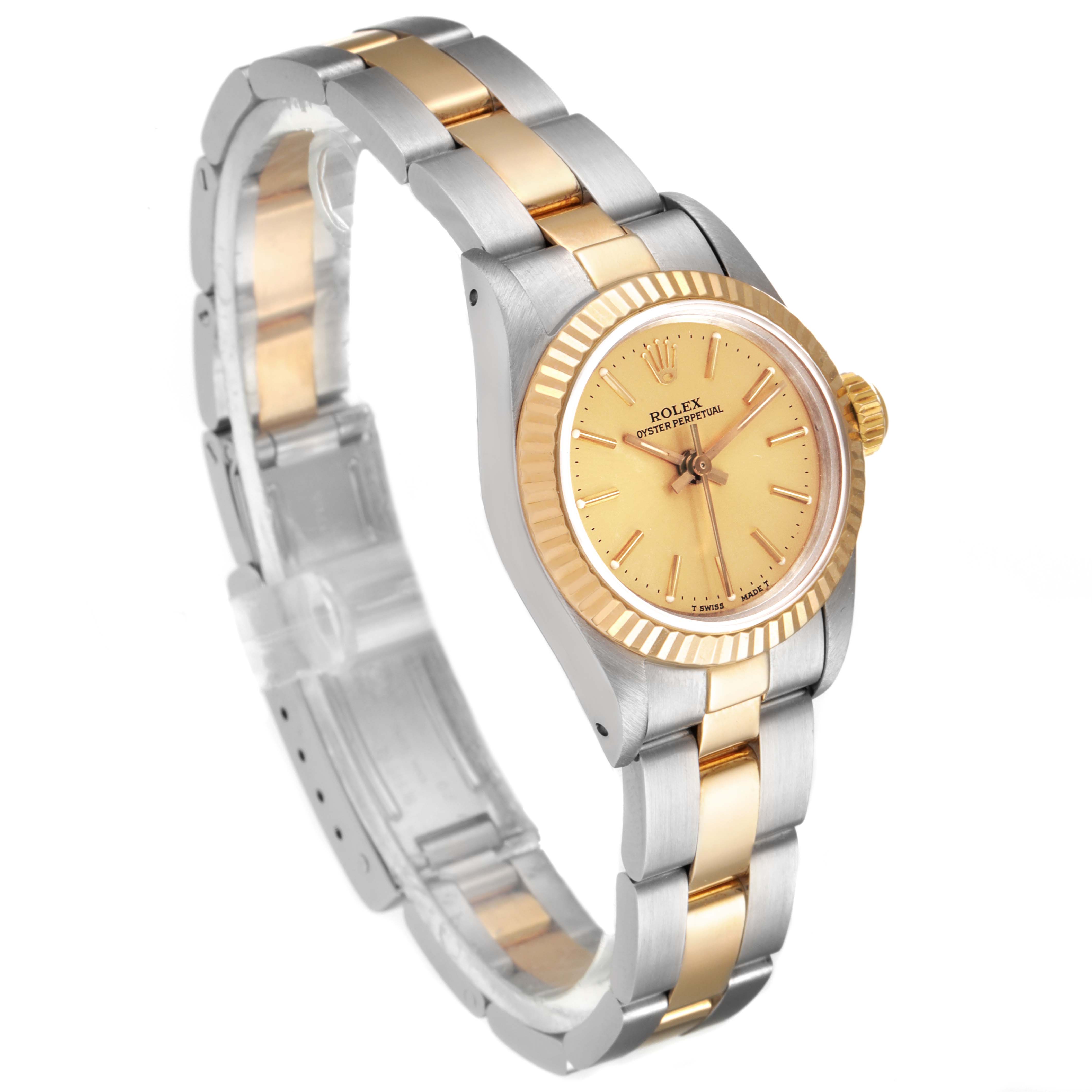 This Rolex Oyster Perpetual 67193 Women's Steel and Gold (two tone) Champagne Dial 67193 Women's Steel and Gold (two tone) Champagne Dial watch is shown from a slight top angle, highlighting its gold and silver strap and gold dial.