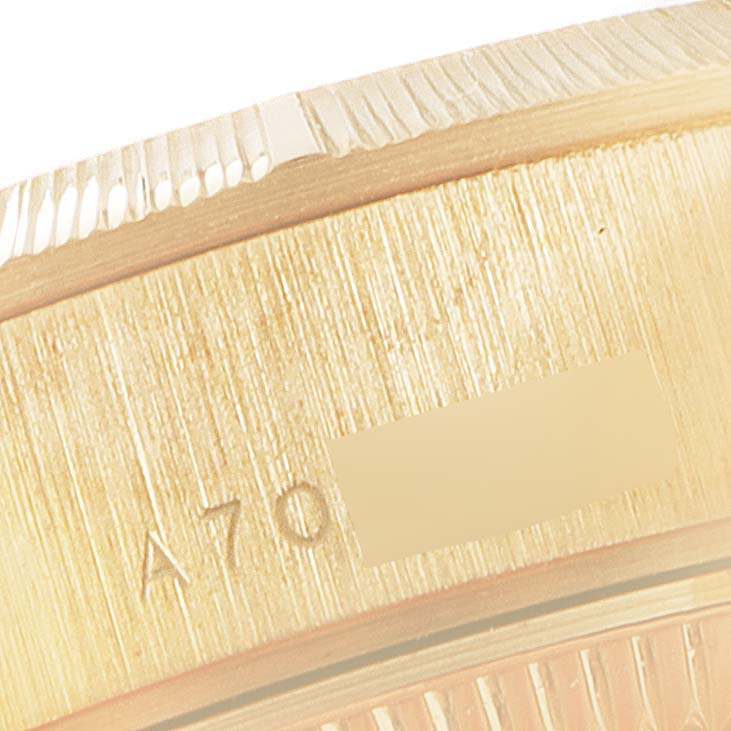 This close-up image shows the engraved edge and fluted bezel of the Rolex President 79278 Women's Yellow Gold White Dial 79278 Women's Yellow Gold White Dial model watch.