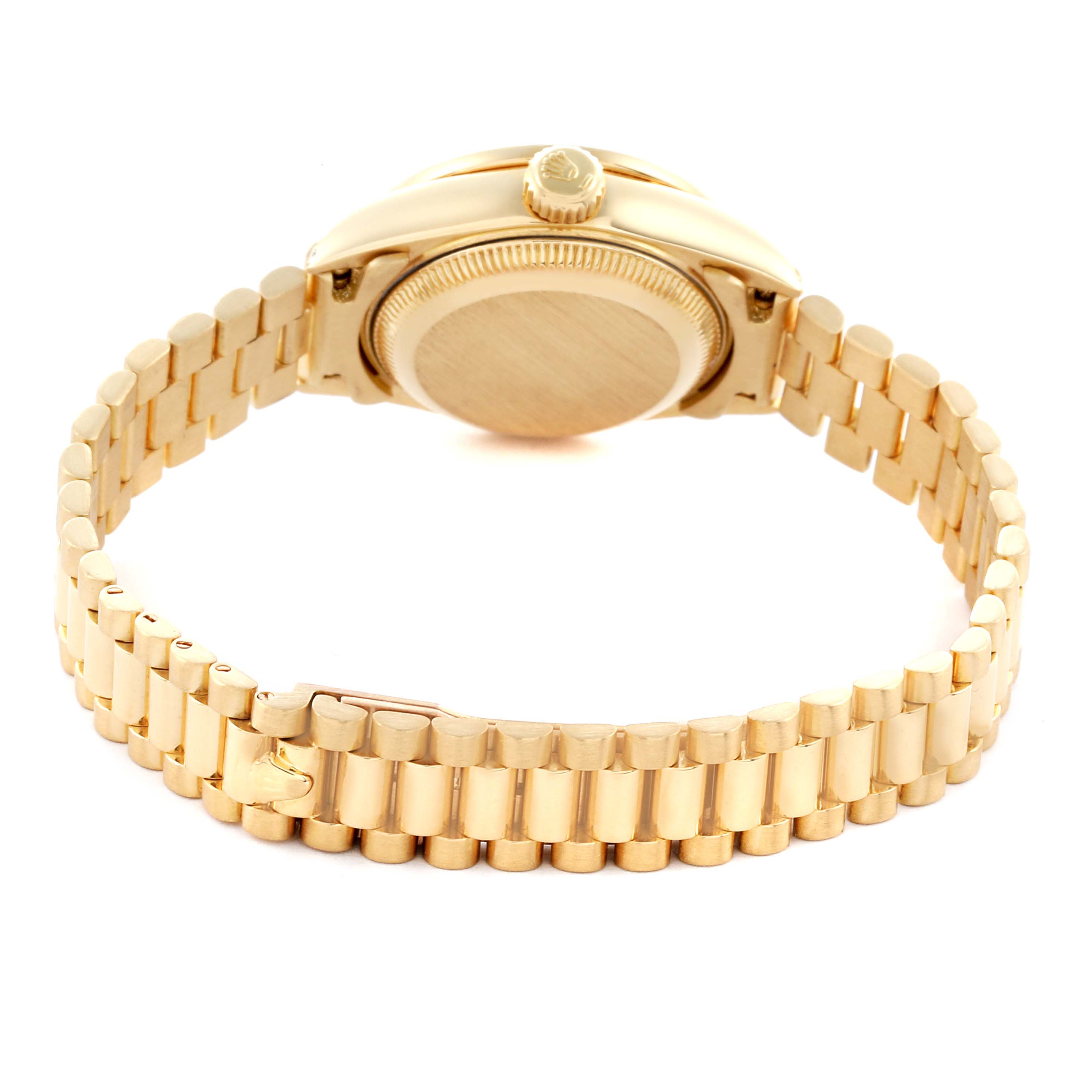 The image shows the back and bracelet of a gold Rolex Datejust watch from a rear angle.