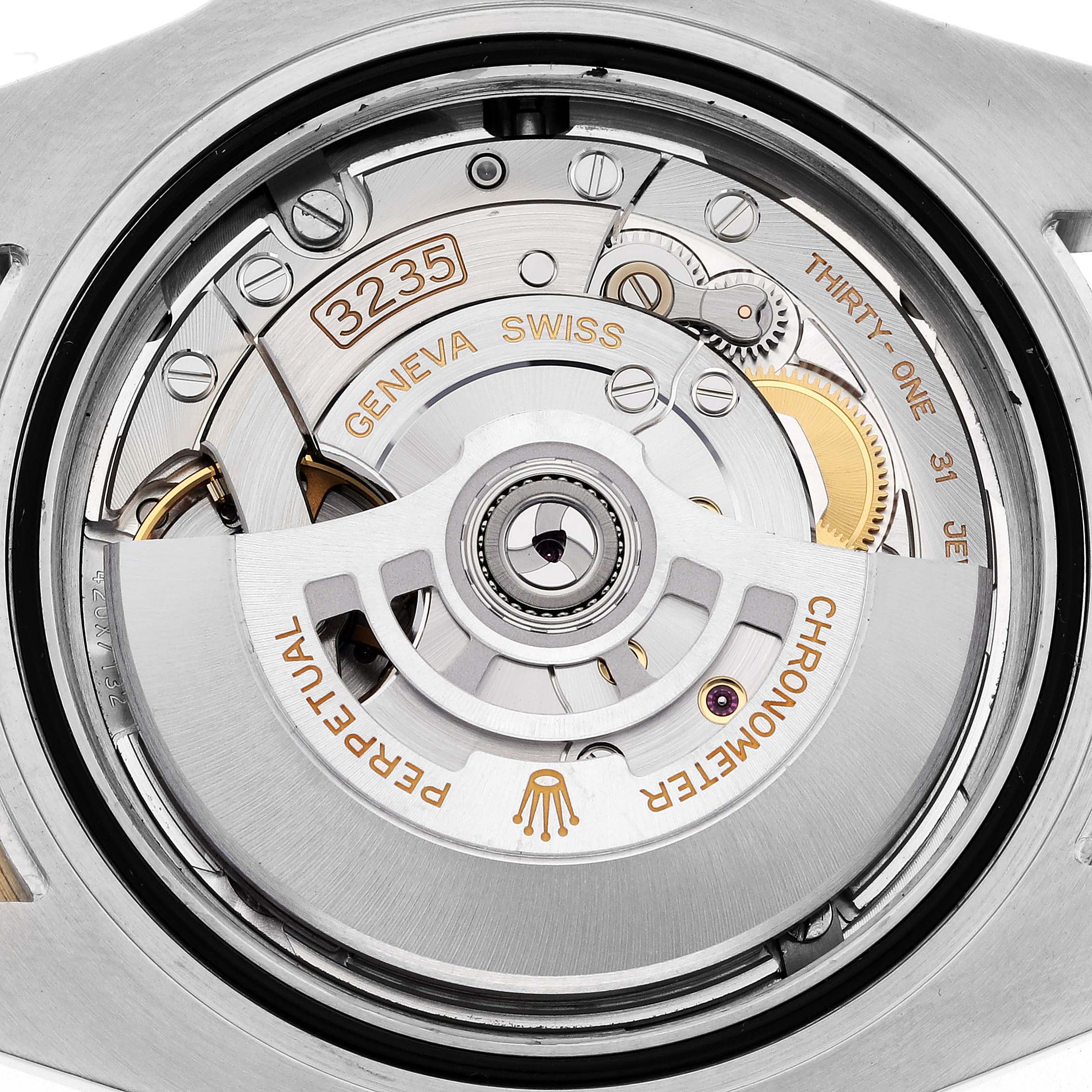 The image shows the movement of a Rolex Submariner 126613LN Men's Steel and Gold (two tone) Black Dial 126613LN Men's Steel and Gold (two tone) Black Dial, highlighting the rotor and intricate components from a close-up angle.