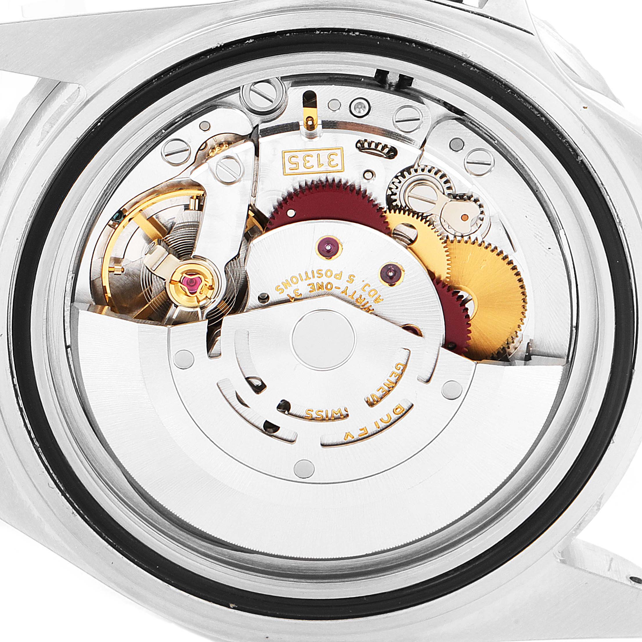 This image shows the intricate inner mechanics of a Rolex Submariner 16610 Men
s Stainless Steel Black Dial 16610 Men
s Stainless Steel Black Dial watch viewed from the back case.