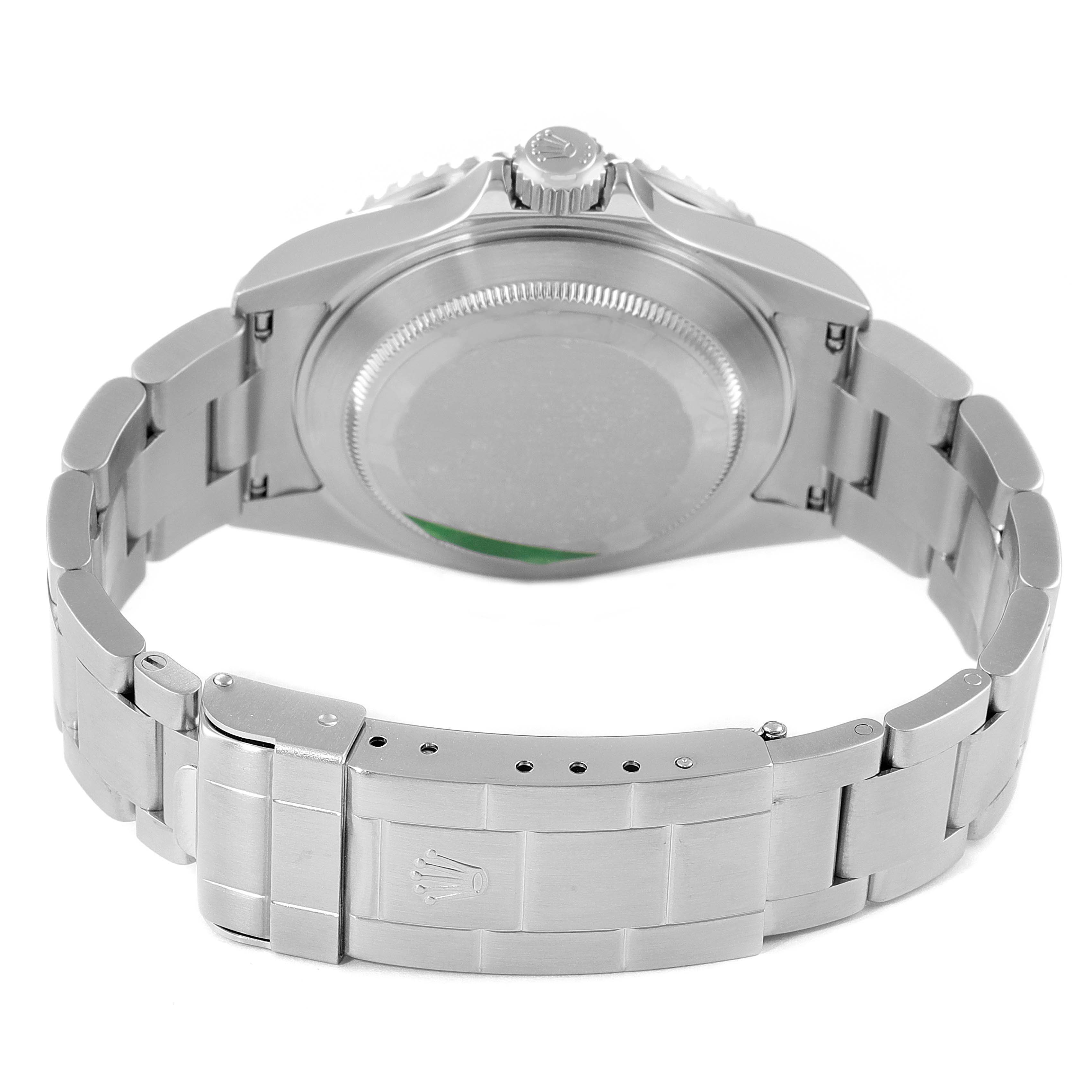 The image shows the back view of a Rolex Submariner 16610 Men
s Stainless Steel Black Dial 16610 Men
s Stainless Steel Black Dial watch, highlighting its case, crown, and metal bracelet.