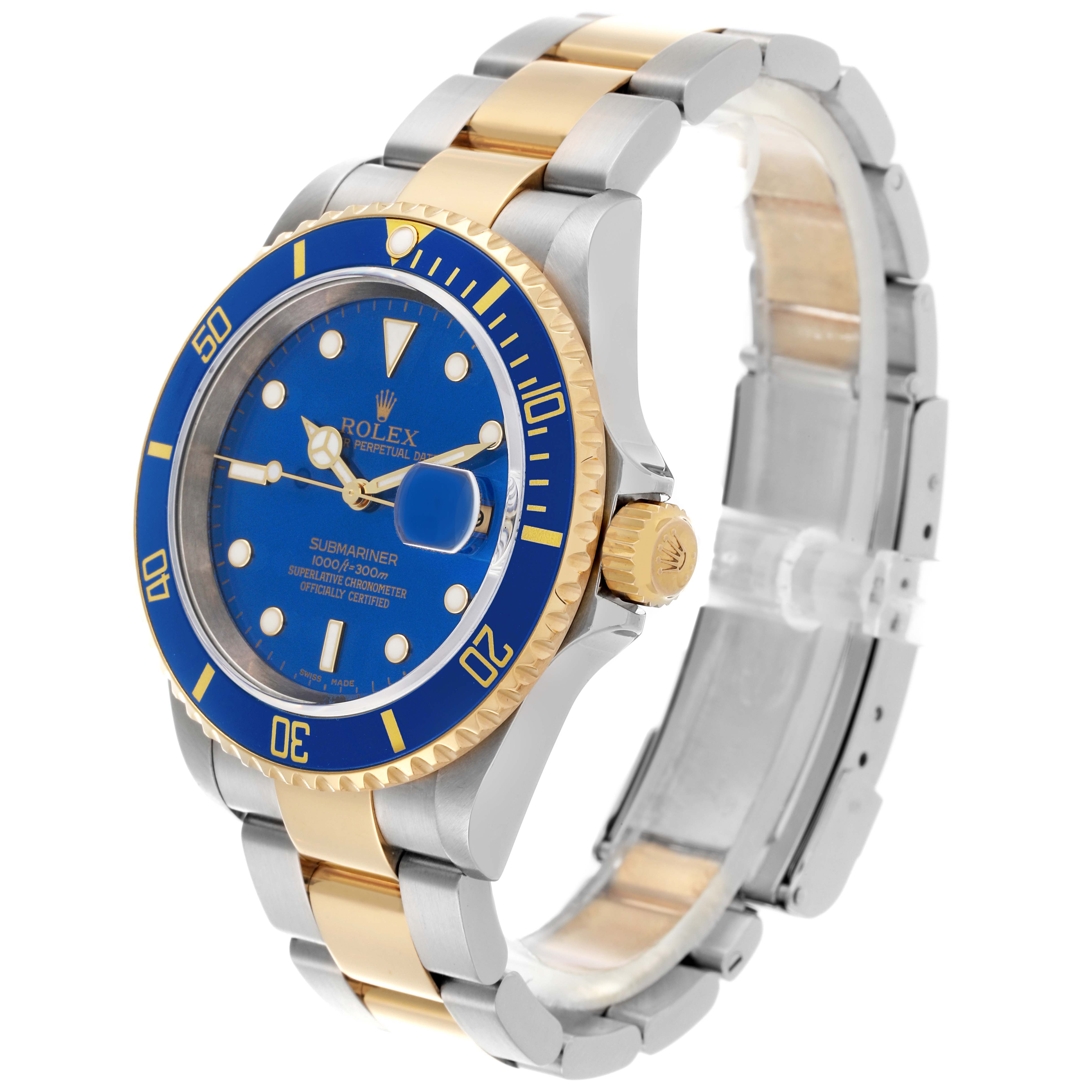 The Rolex Submariner 16613 Men's Steel and Gold (two tone) Blue Dial 16613 Men's Steel and Gold (two tone) Blue Dial watch is shown at an angled side view, featuring its blue dial, bezel, crown, and two-tone bracelet.