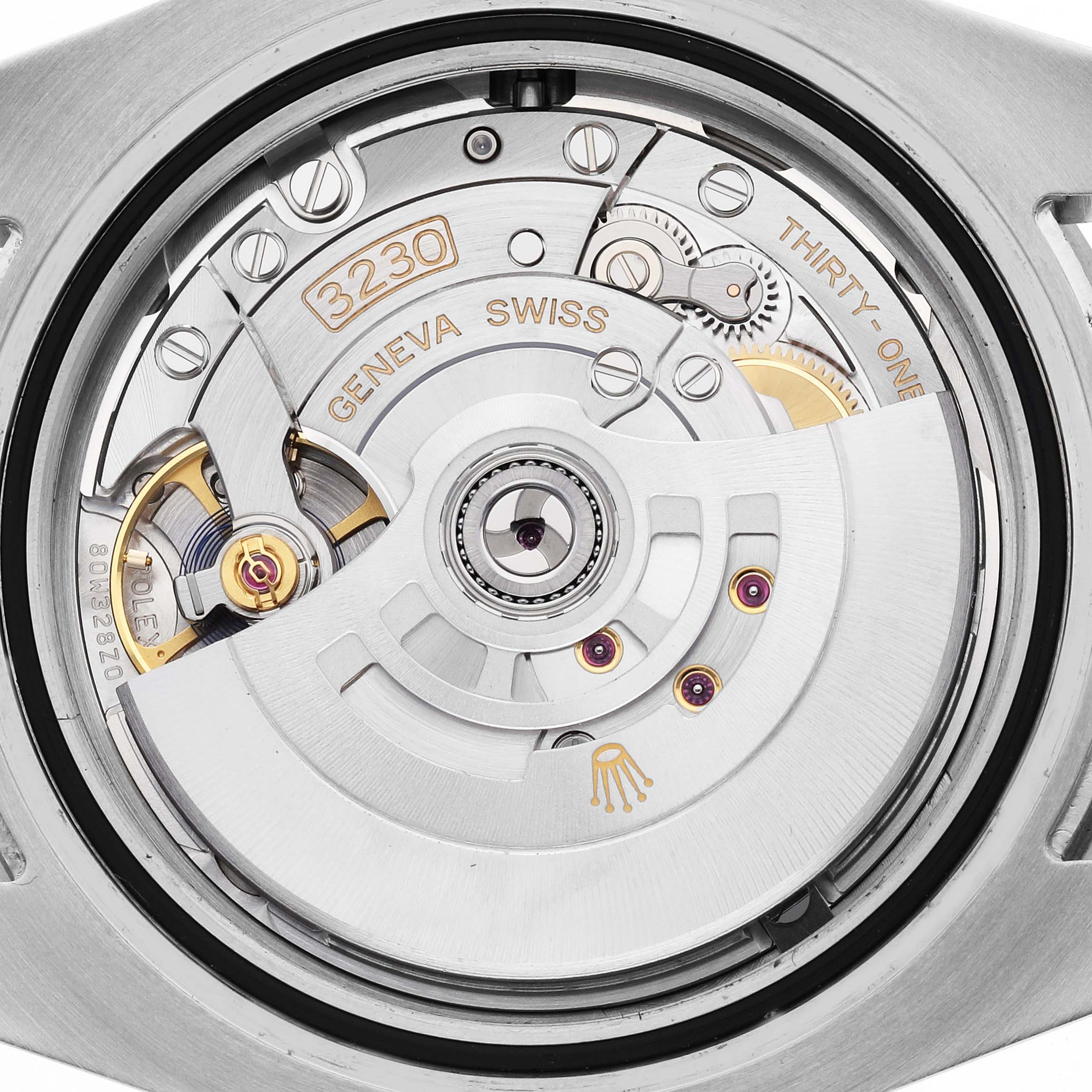 The image shows the back view of a Rolex Submariner 124060 Men's Stainless Steel Black Dial, focusing on its intricate movement and components.