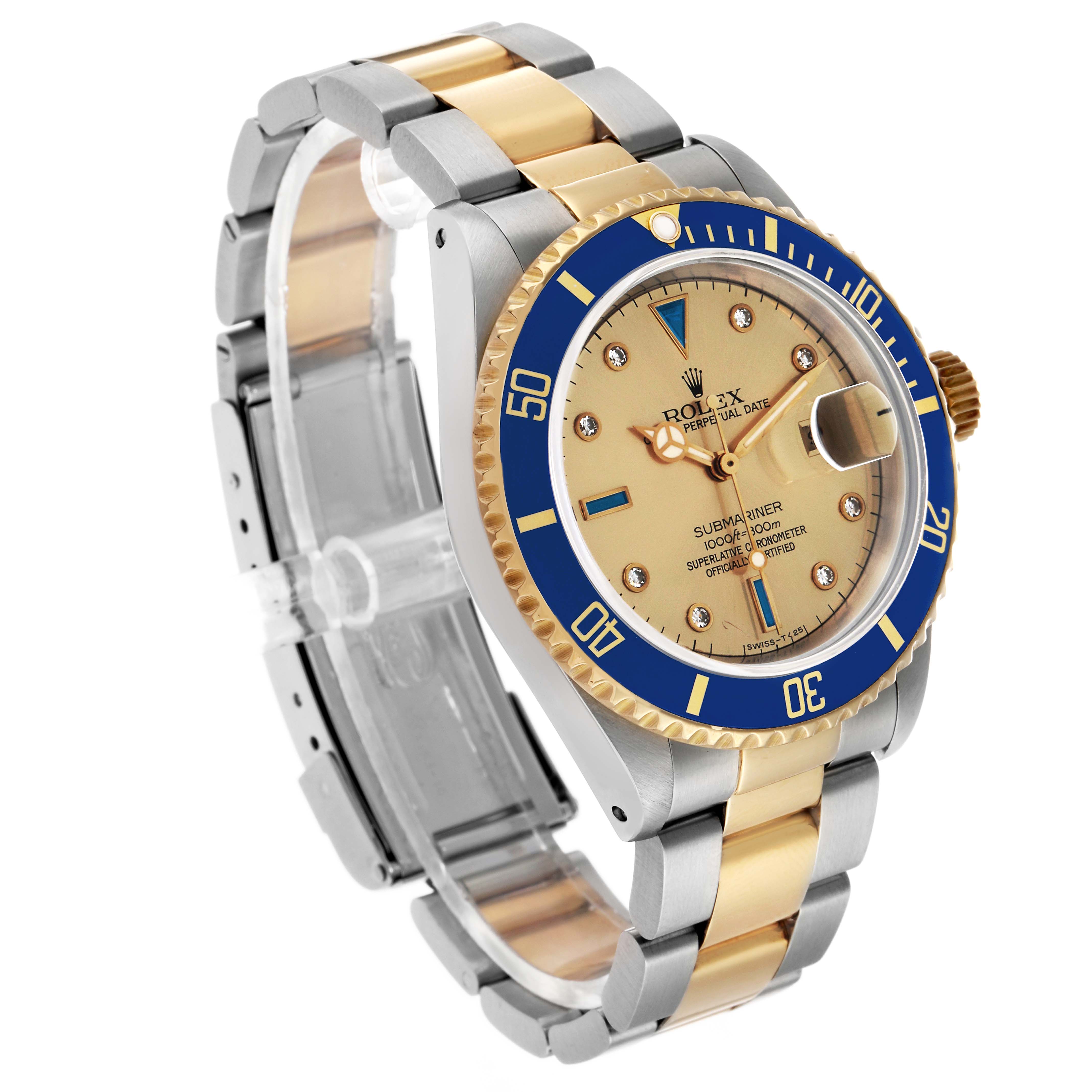 The Rolex Submariner 16613 Men's Steel and Gold (two tone) Champagne Dial watch is shown at a three-quarter angle, highlighting its blue bezel, gold and silver bracelet, and dial.