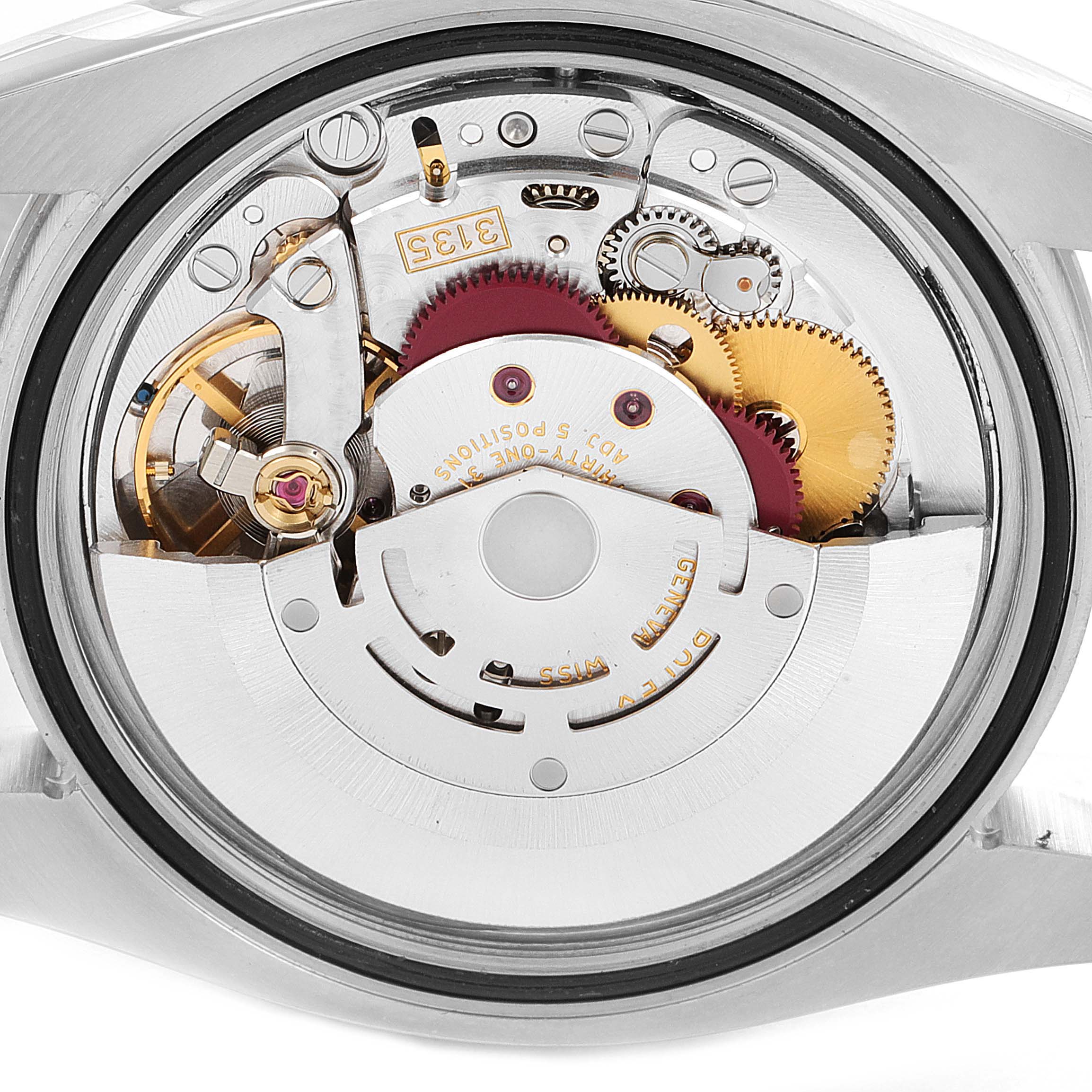 The image shows the internal mechanism and movement of a Rolex Turn-o-Graph 116264 Men
s Stainless Steel White Dial 116264 Men
s Stainless Steel White Dial watch from a rear angle.