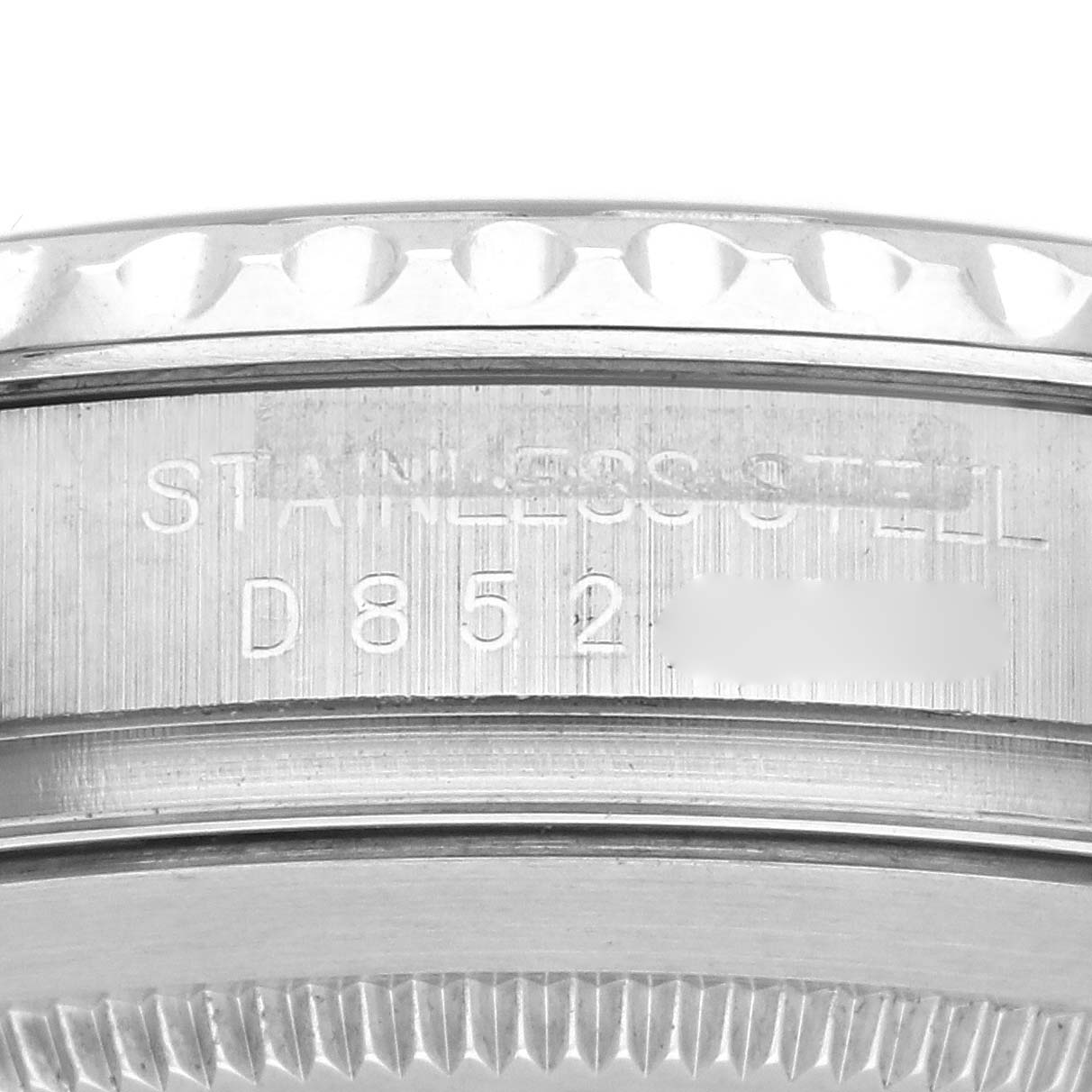 The image shows the side of a Rolex Yacht-Master 16622 Men
s Stainless Steel Silver Dial 16622 Men
s Stainless Steel Silver Dial watch with engraving details.