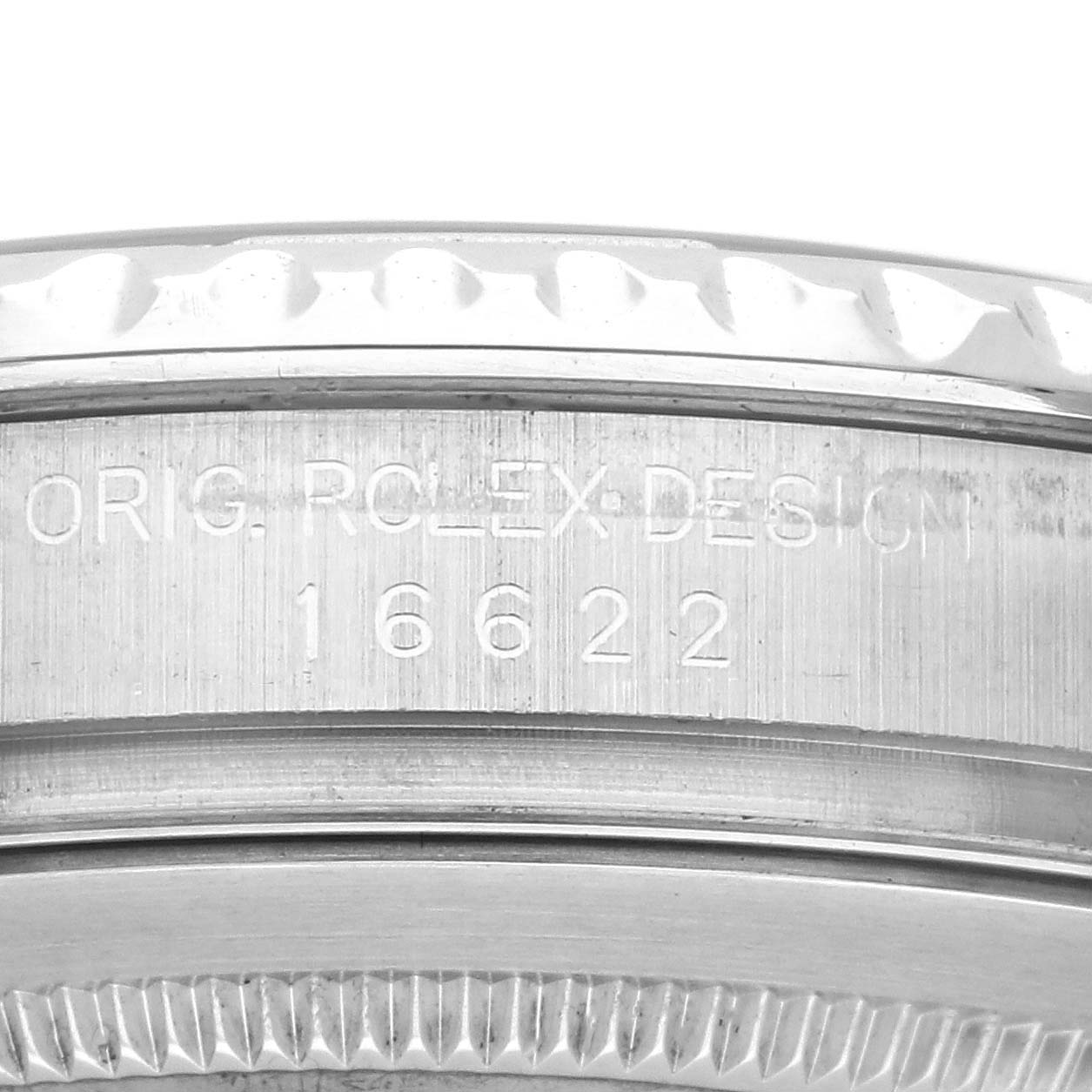 The image shows the side view of a Rolex Yacht-Master 16622 Men
s Stainless Steel Silver Dial 16622 Men
s Stainless Steel Silver Dial watch, focusing on the engraved case with model number 16622.