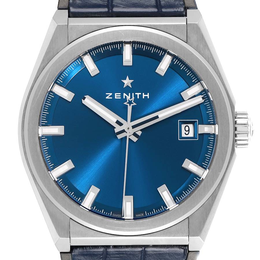 The Zenith Defy 95.9000.670/51 Men's Titanium Blue Dial watch is shown from the front, displaying its blue dial, date window, and crown.