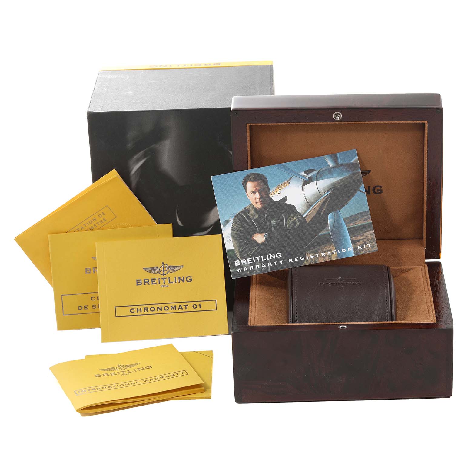 This image shows the packaging and accessories of a Breitling Chronomat HB011112/BA51 Men's Rose Gold Black Dial HB011112/BA51 Men's Rose Gold Black Dial watch, including a watch box, manual, and warranty.