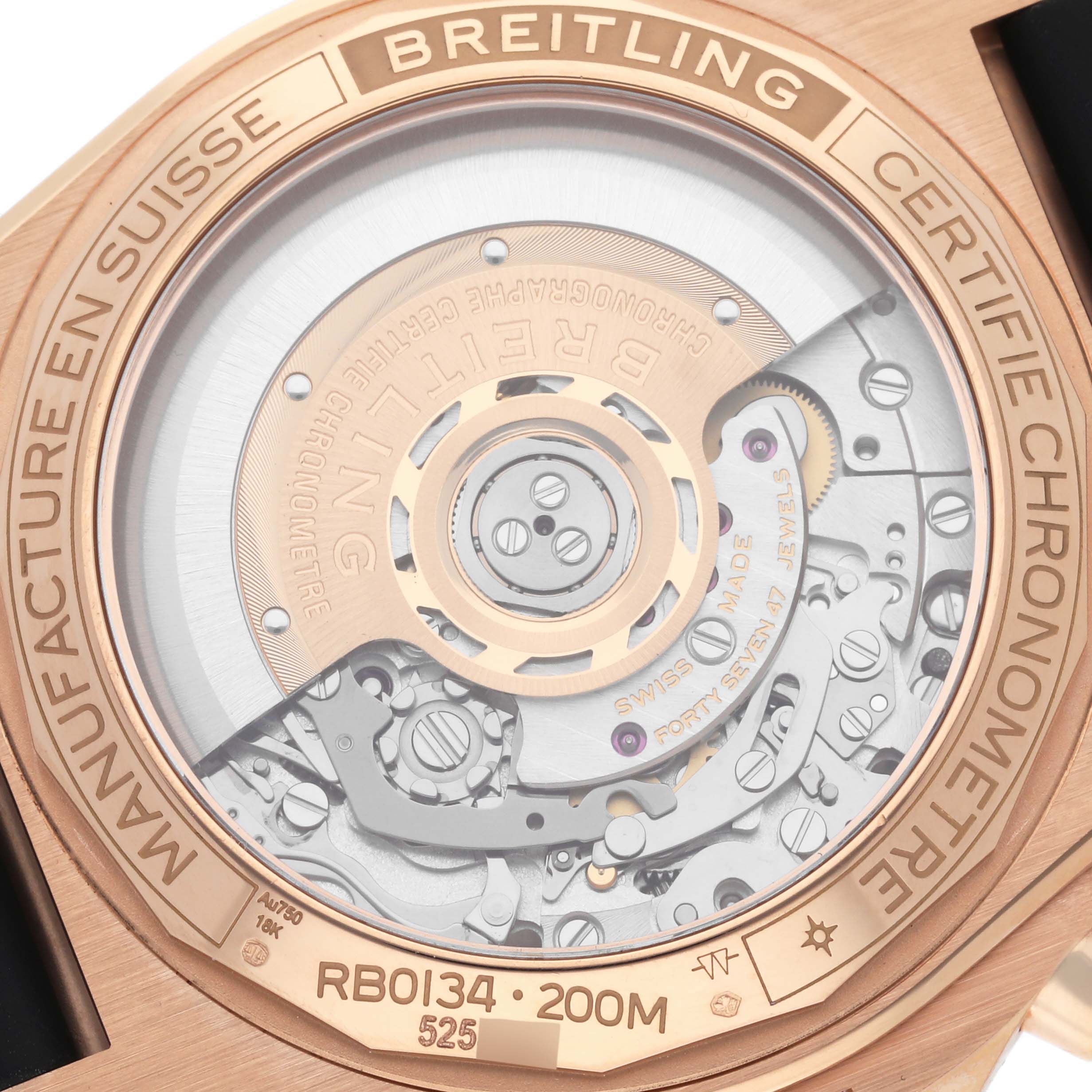 The image shows the back view of a Breitling Chronomat RB0134 Men's Rose Gold Grey Dial RB0134 Men's Rose Gold Grey Dial, highlighting its intricate mechanical movement.