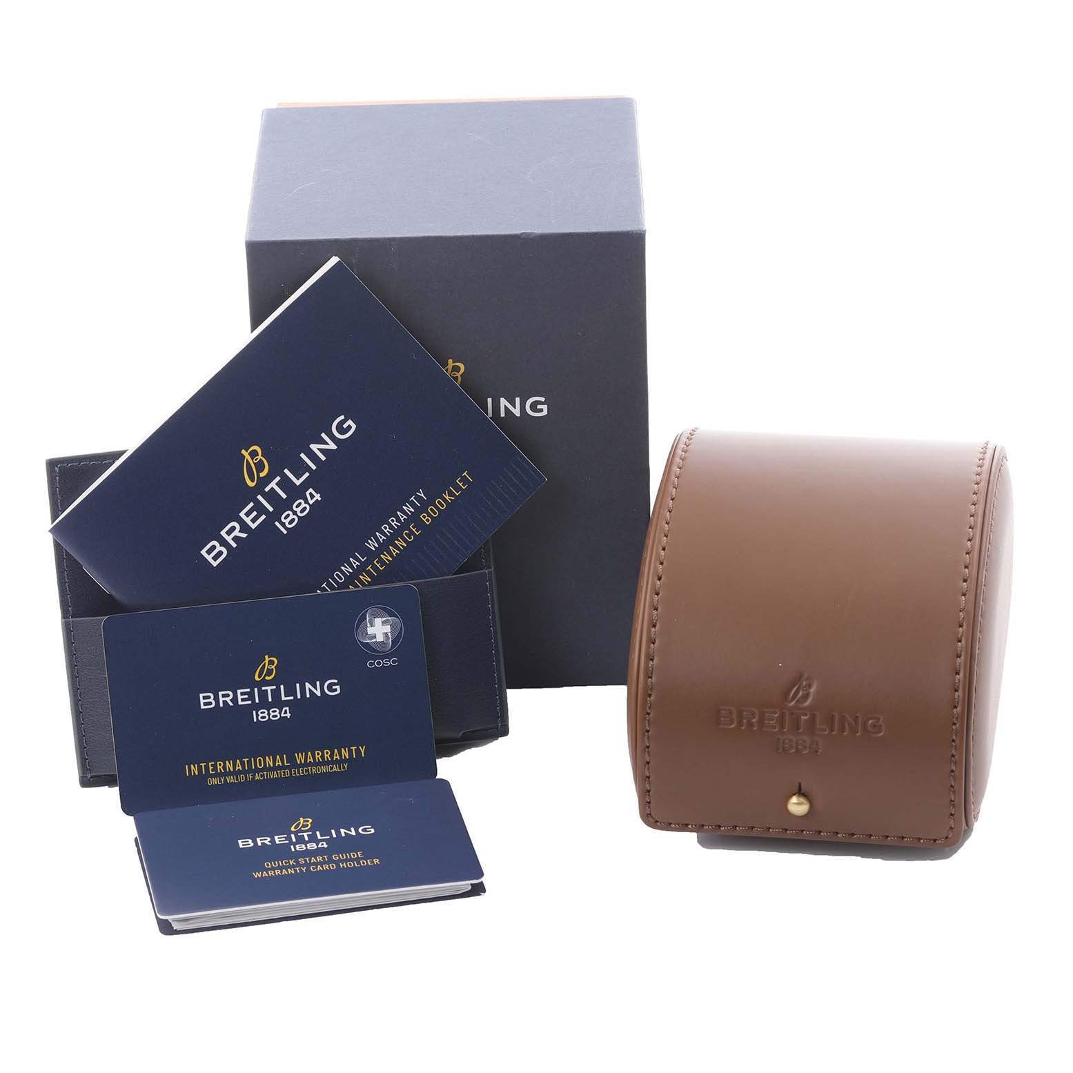 The image shows the Breitling A17395 Women's Stainless Steel Pink Dial A17395 Women's Stainless Steel Pink Dial Navitimer Automatic 35 watch box, pouch, and warranty cards.