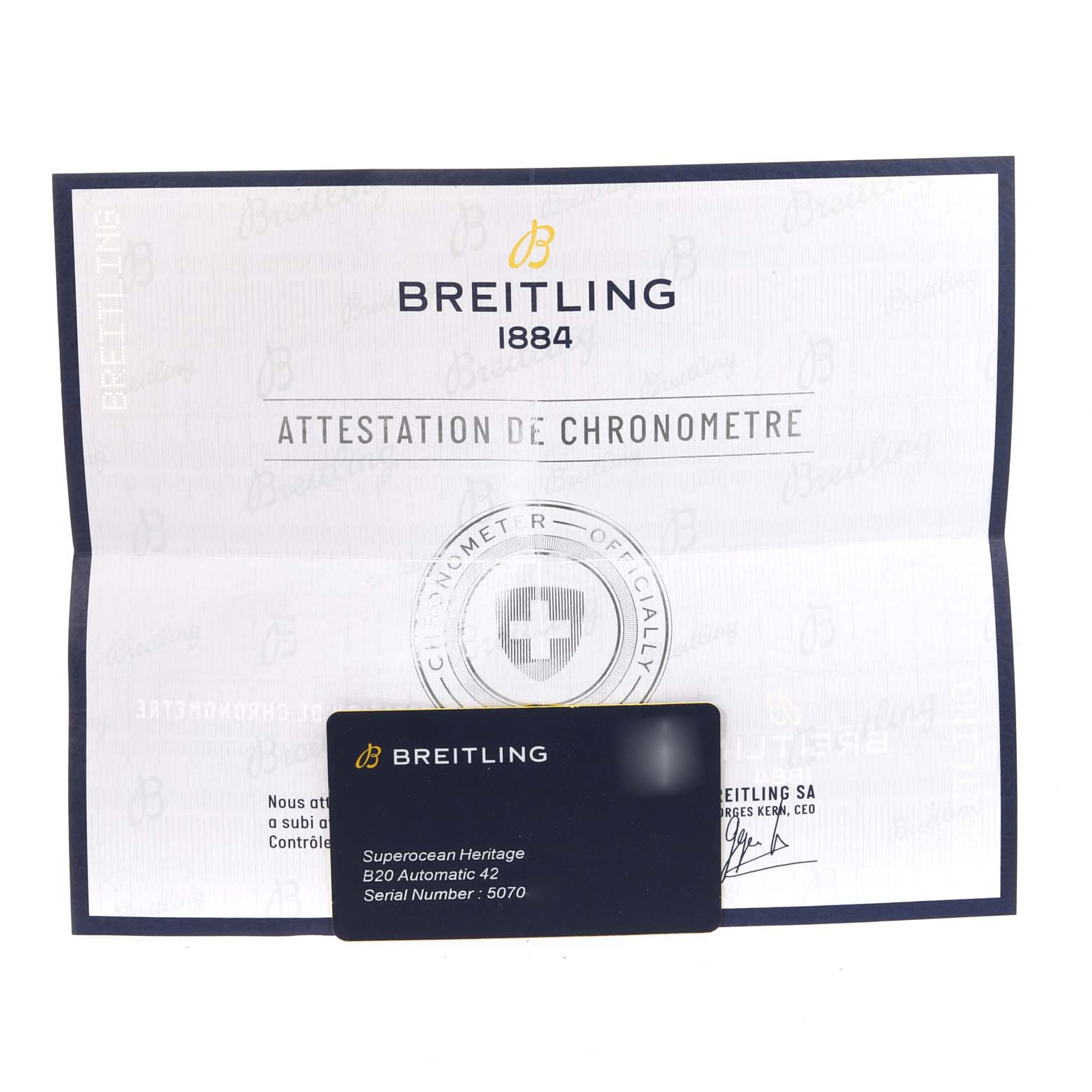 The image shows the chronometer attestation certificate and an information card for the Breitling Superocean UB2010121B1S1 Men's Steel and Gold (two tone) Black Dial UB2010121B1S1 Men's Steel and Gold (two tone) Black Dial Heritage B20 Automatic 42 watch.