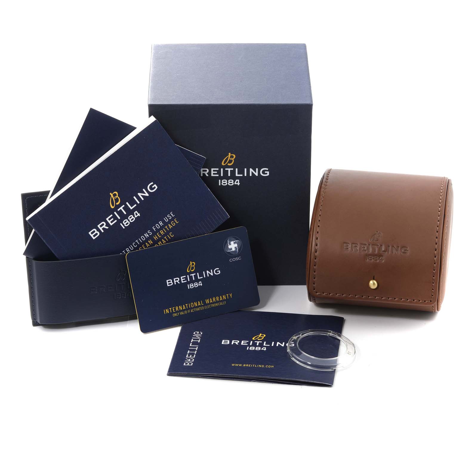 The image shows the packaging, manuals, international warranty card, and a travel case for the Breitling Superocean UB2010121B1S1 Men's Steel and Gold (two tone) Black Dial UB2010121B1S1 Men's Steel and Gold (two tone) Black Dial watch.