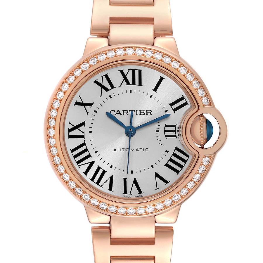 The Cartier Ballon Bleu watch is shown from the front, displaying the dial, Roman numerals, and diamond-set bezel.