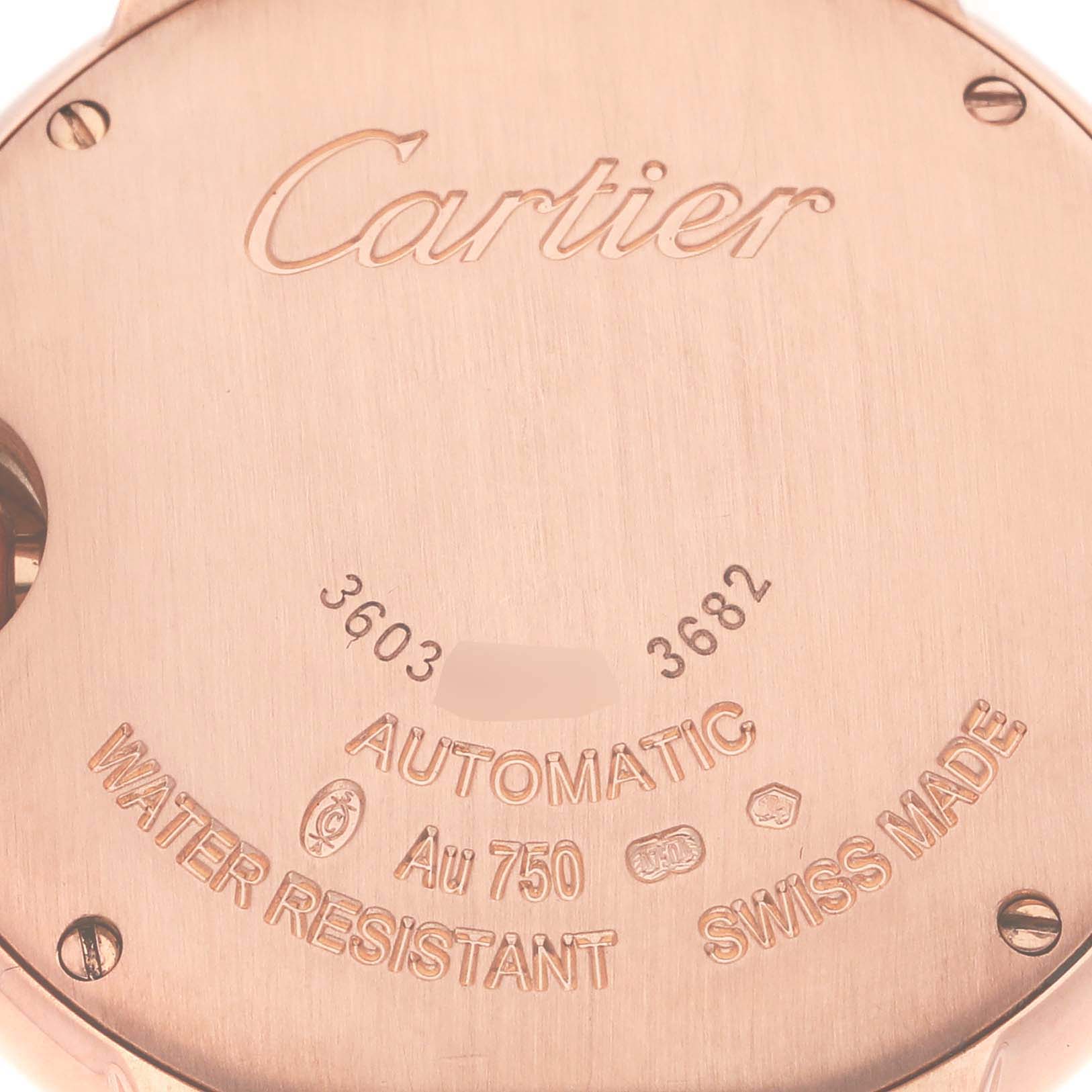 The image shows the back of a Cartier Ballon Bleu WJBB0036 Women's Rose Gold Silver Dial WJBB0036 Women's Rose Gold Silver Dial watch, highlighting engravings and screws.