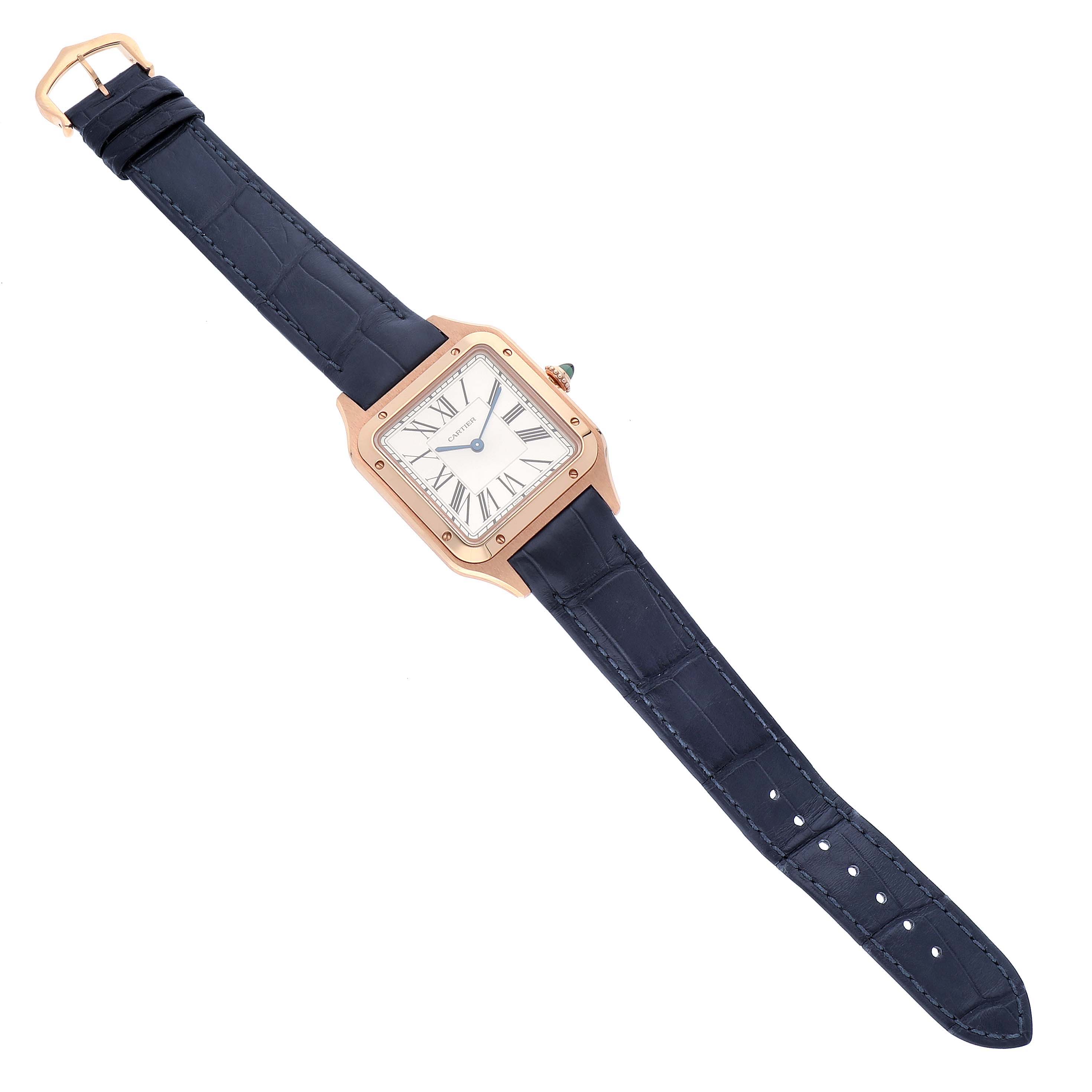 The image shows a top view of a Cartier Santos Dumont WGSA0021 Men's Rose Gold Silver Dial WGSA0021 Men's Rose Gold Silver Dial watch with a blue strap and a square dial.