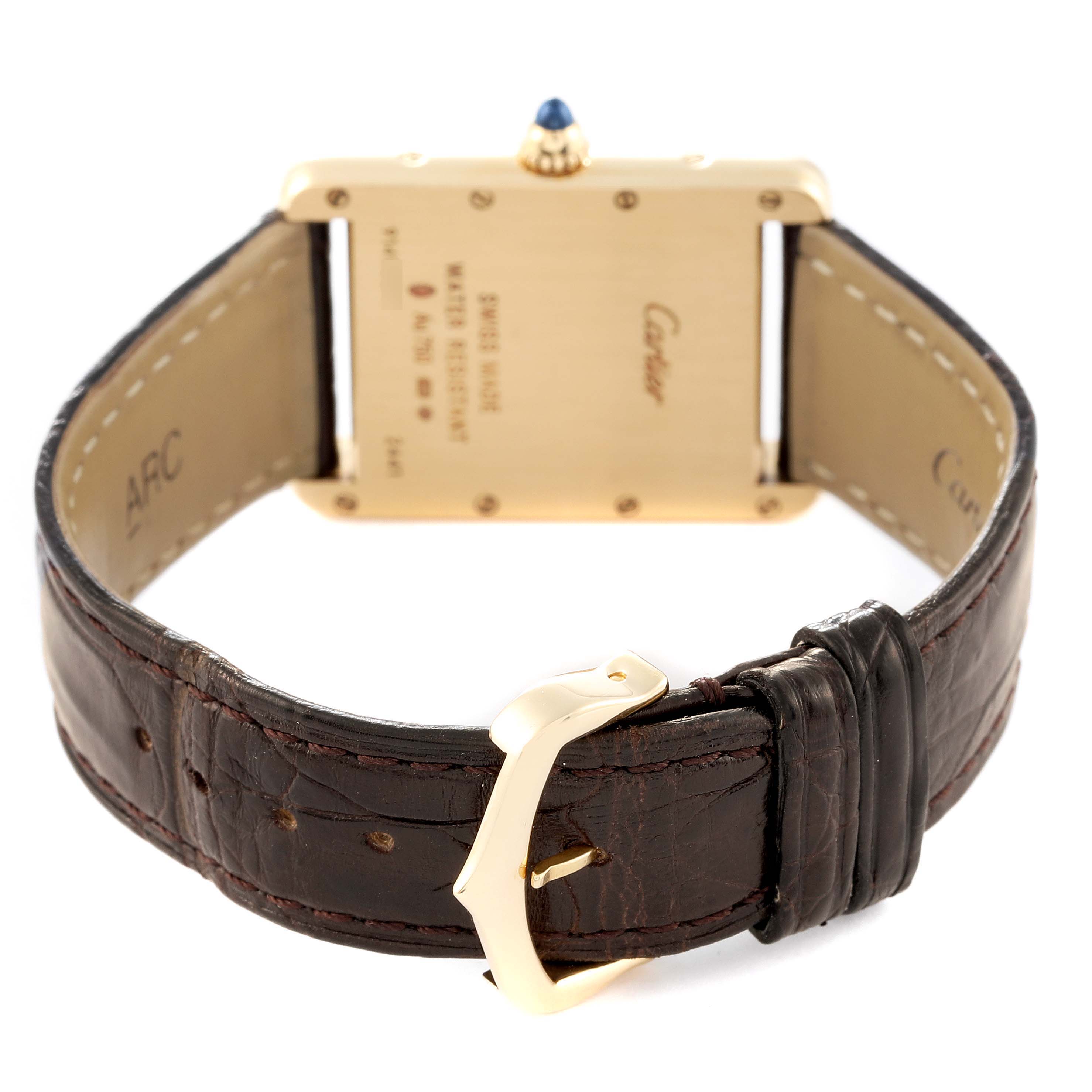 The image shows the back case and leather strap of a Tank Louis Cartier watch.