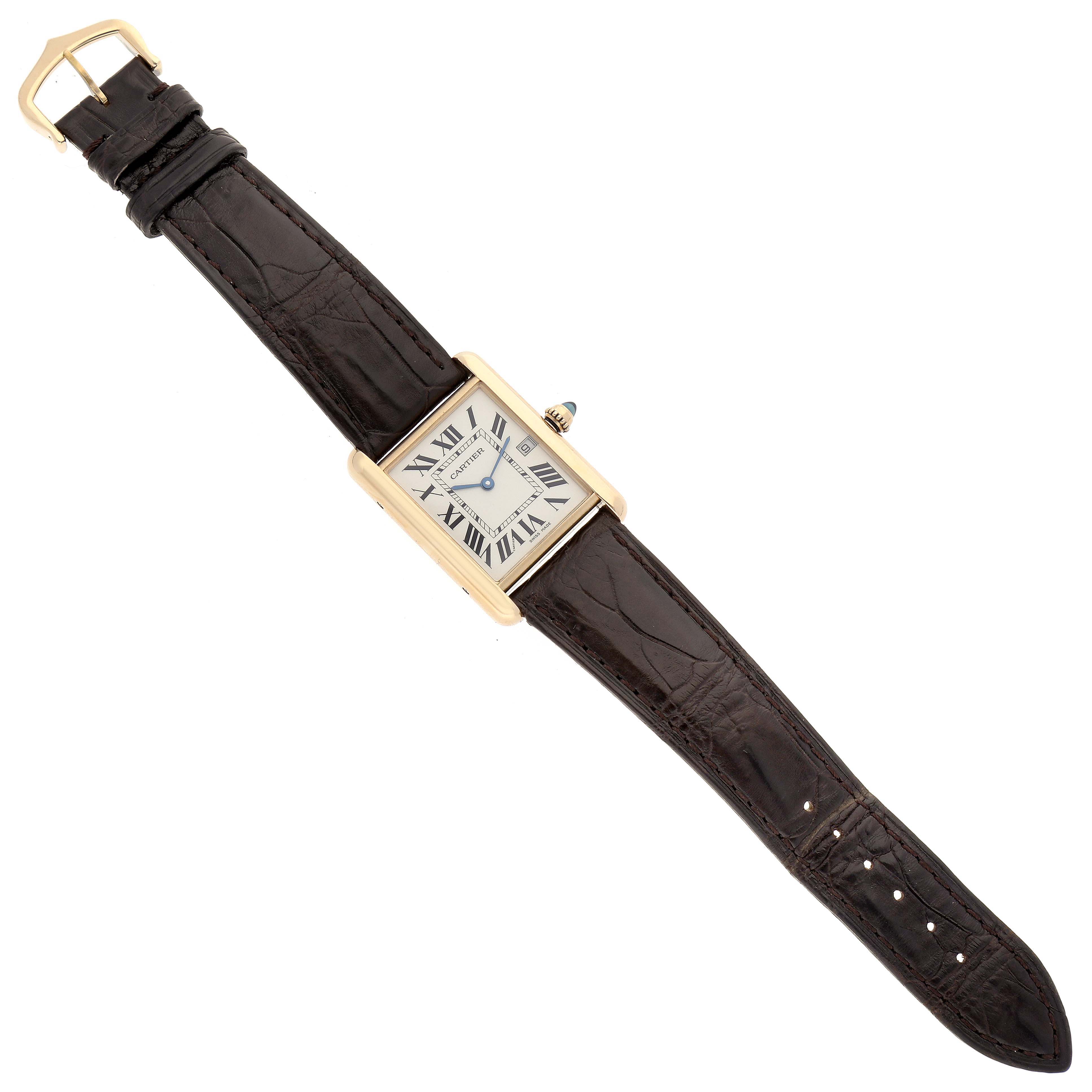 The image shows a top-down view of a Cartier Tank Louis W1529756 Men's Yellow Gold Silver Dial W1529756 Men's Yellow Gold Silver Dial watch, showcasing the face, leather strap, and buckle.