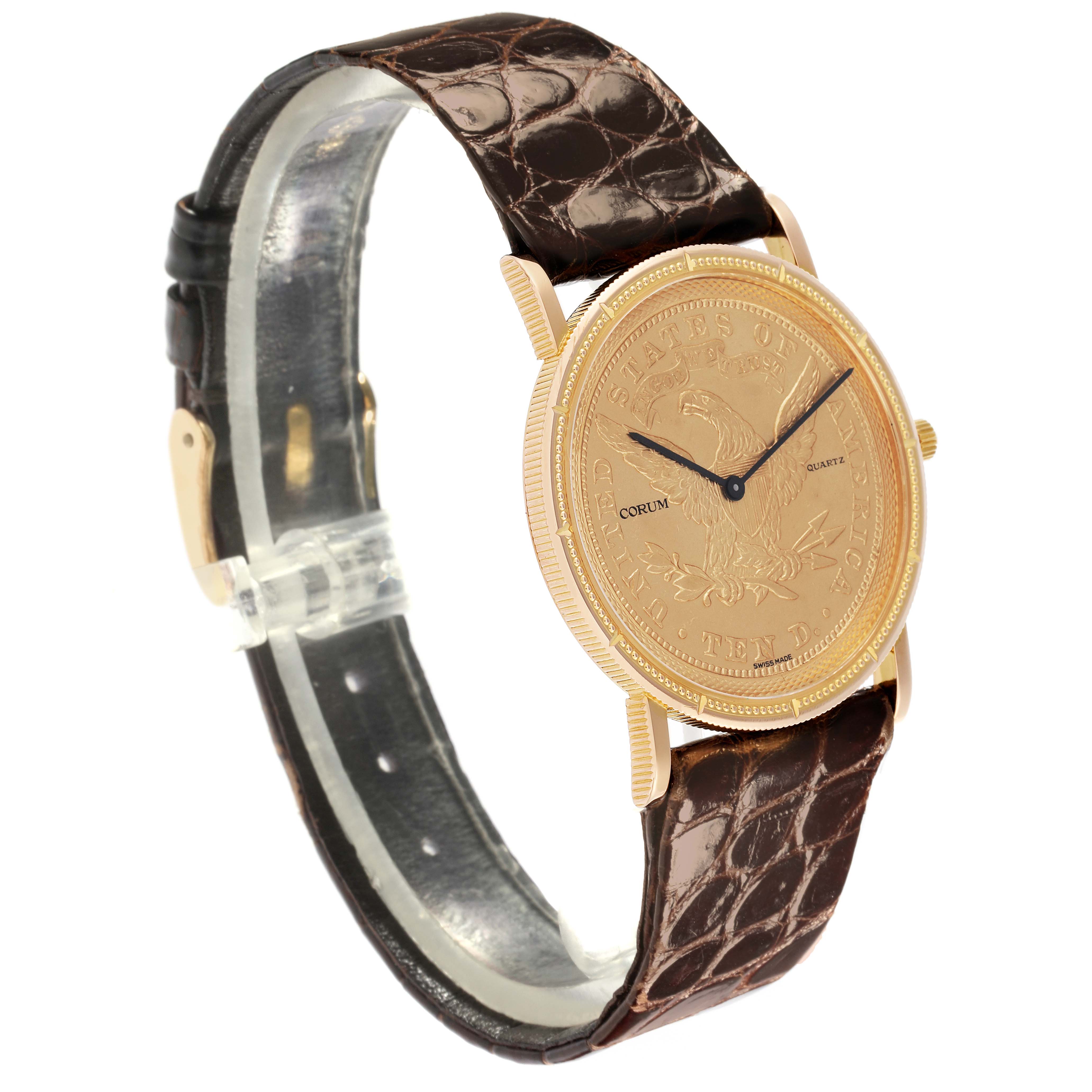 The Corum Coin Watch 1903 Men's Yellow Gold Yellow Dial 1903 Men's Yellow Gold Yellow Dial is shown at a three-quarter angle, highlighting its gold face, black hands, and brown leather strap.