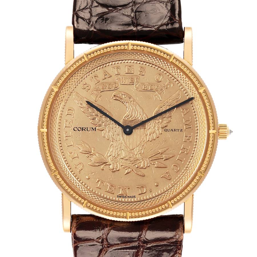 The Corum Coin Watch is shown from a front angle, displaying the coin design on the face and a leather strap.