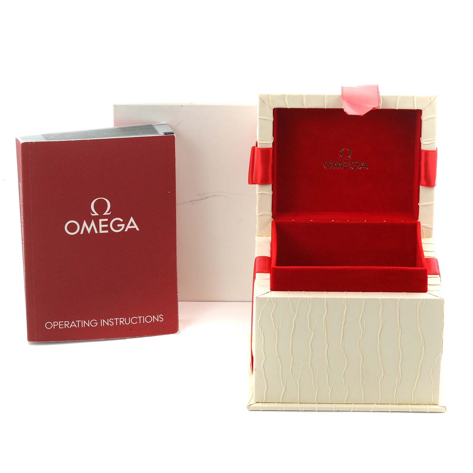 The image shows the open box and operating instructions for the Omega 4586.75.00 Women's Stainless Steel Mother of Pearl Dial 4586.75.00 Women's Stainless Steel Mother of Pearl Dial DeVille Prestige Diamond Steel Yellow Gold Ladies Watch 4586.75.00.