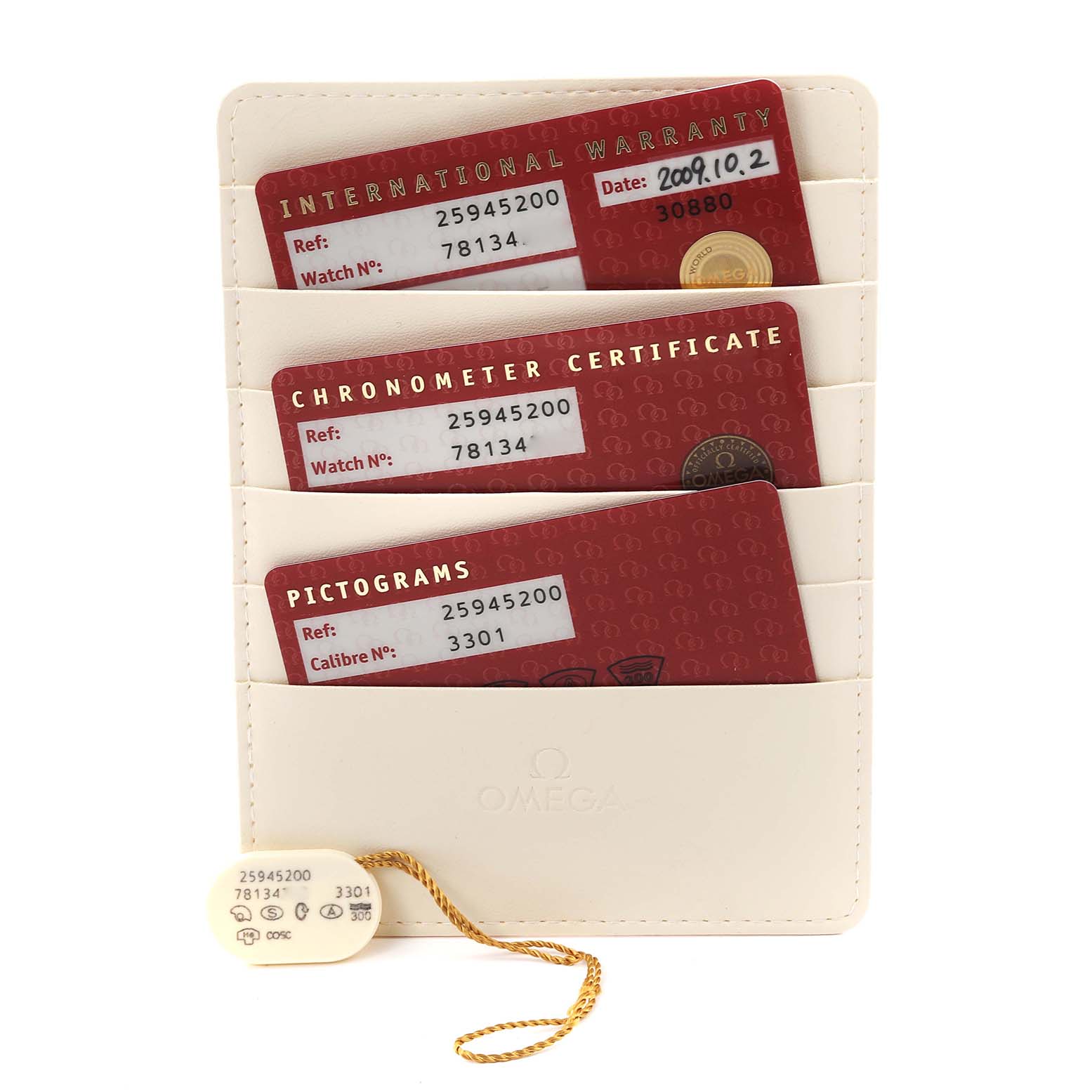 This image shows warranty, chronometer certificate, and pictogram cards for an Omega Seamaster 2594.52.00 Men
s Stainless Steel Black Dial 2594.52.00 Men
s Stainless Steel Black Dial watch, along with a tag.