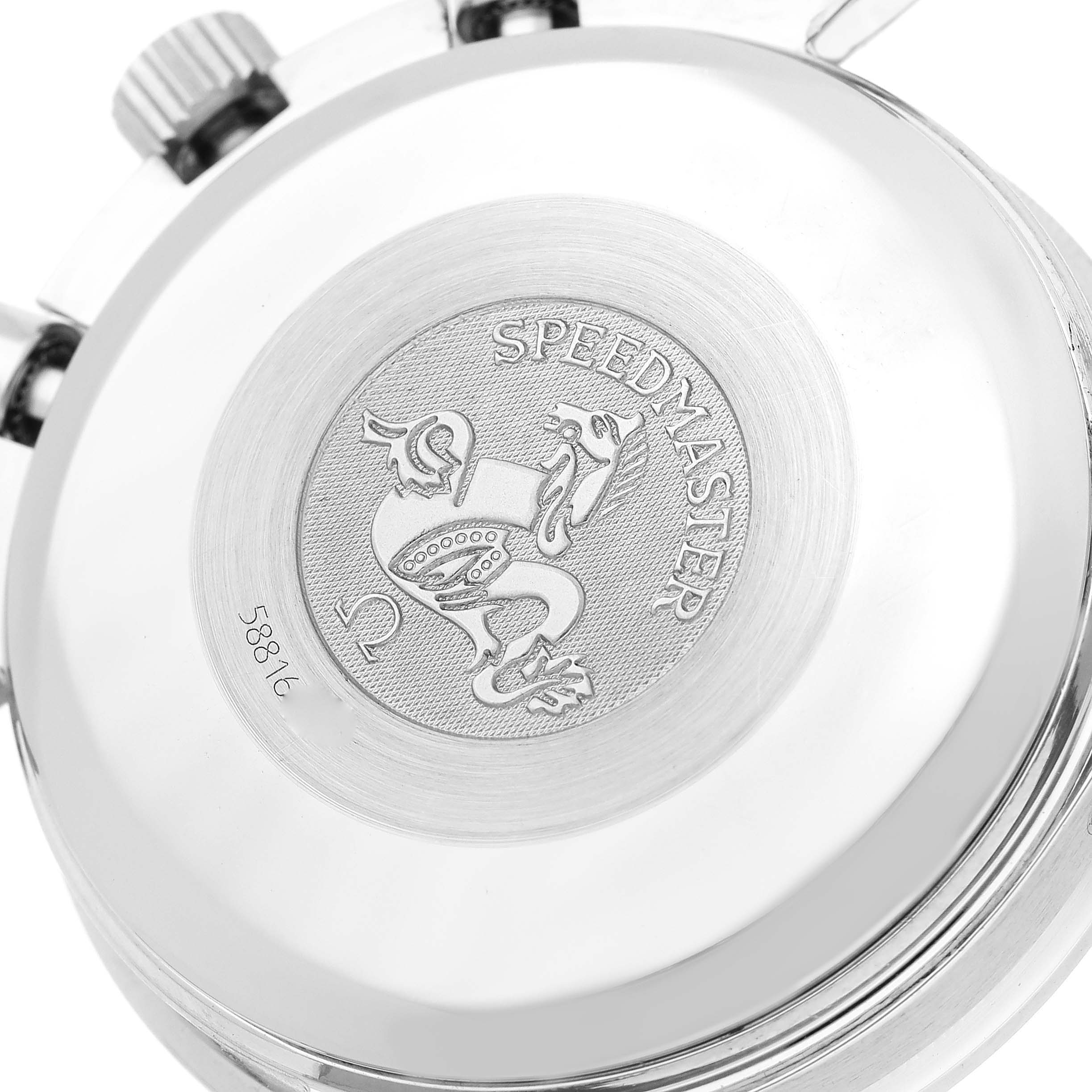 The image shows the back case of an Omega Speedmaster 3523.80.00 Men
s Stainless Steel Blue Dial 3523.80.00 Men
s Stainless Steel Blue Dial watch, featuring its logo and engravings.