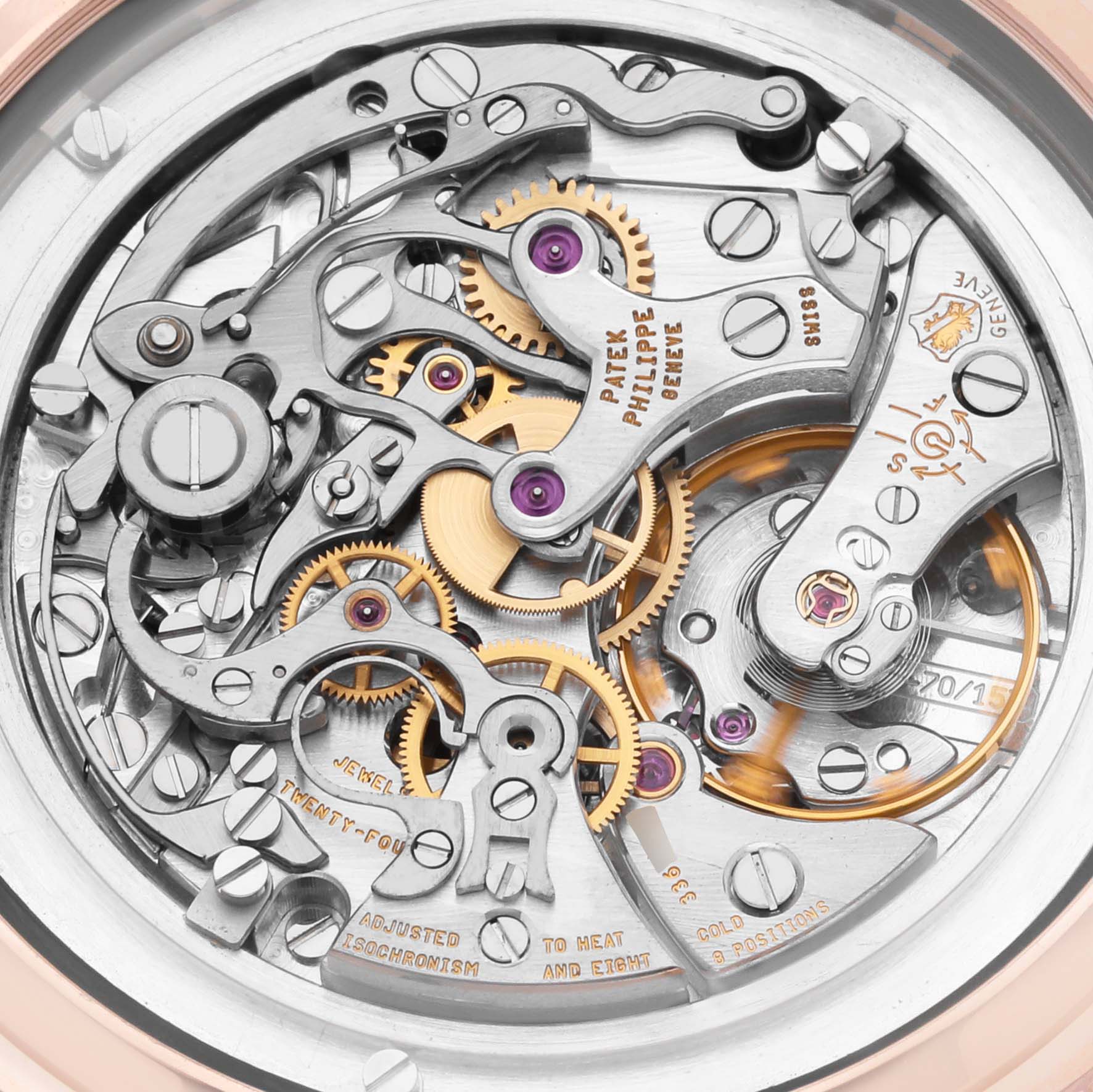 The image shows the intricate movement of a Patek Philippe Complications 5070R-001 Men's Rose Gold Silver Dial watch from a back angle, highlighting gears and engravings.